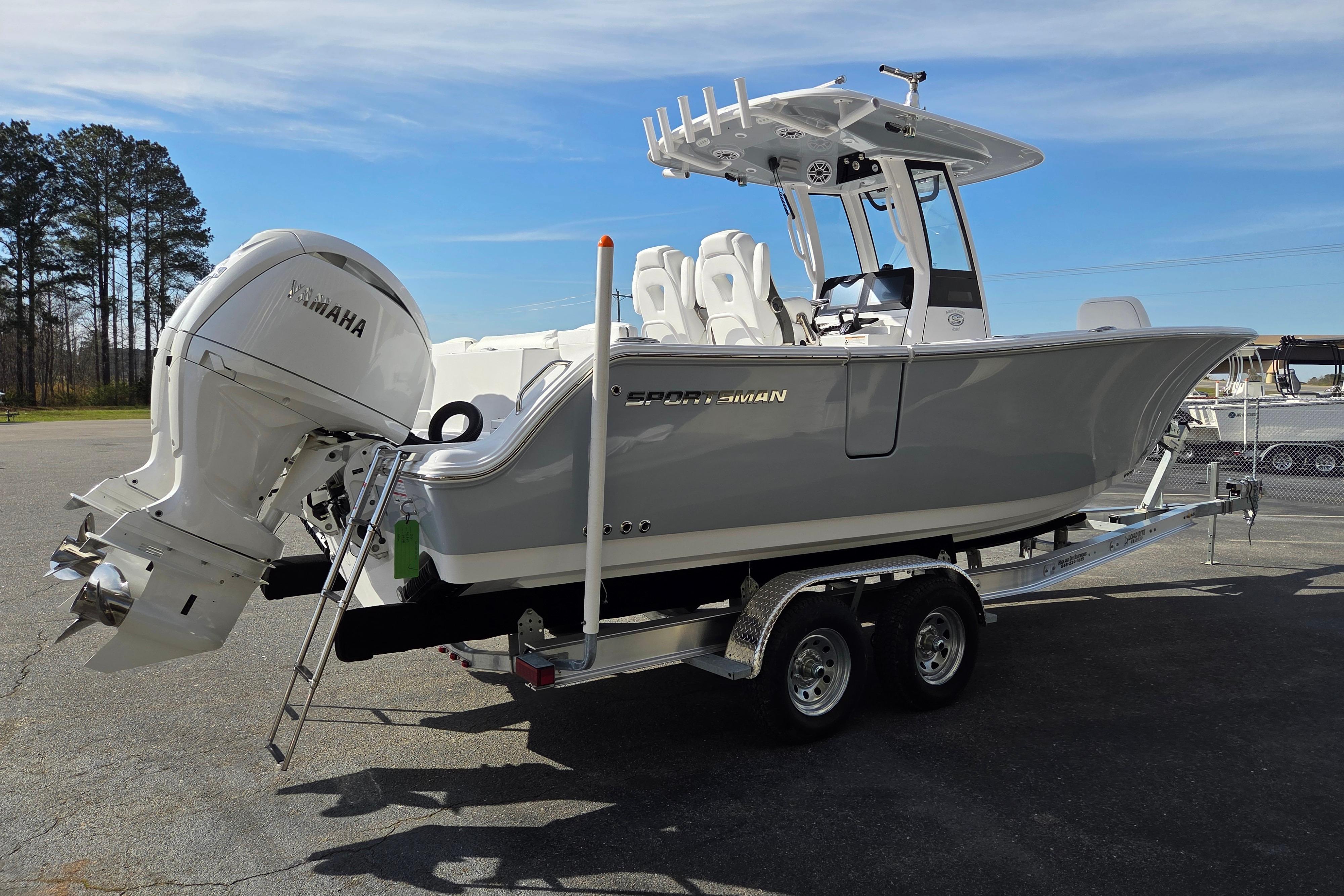 2026 Sportsman Heritage 261 Center Console boat on trailer with Yamaha outboard motor.