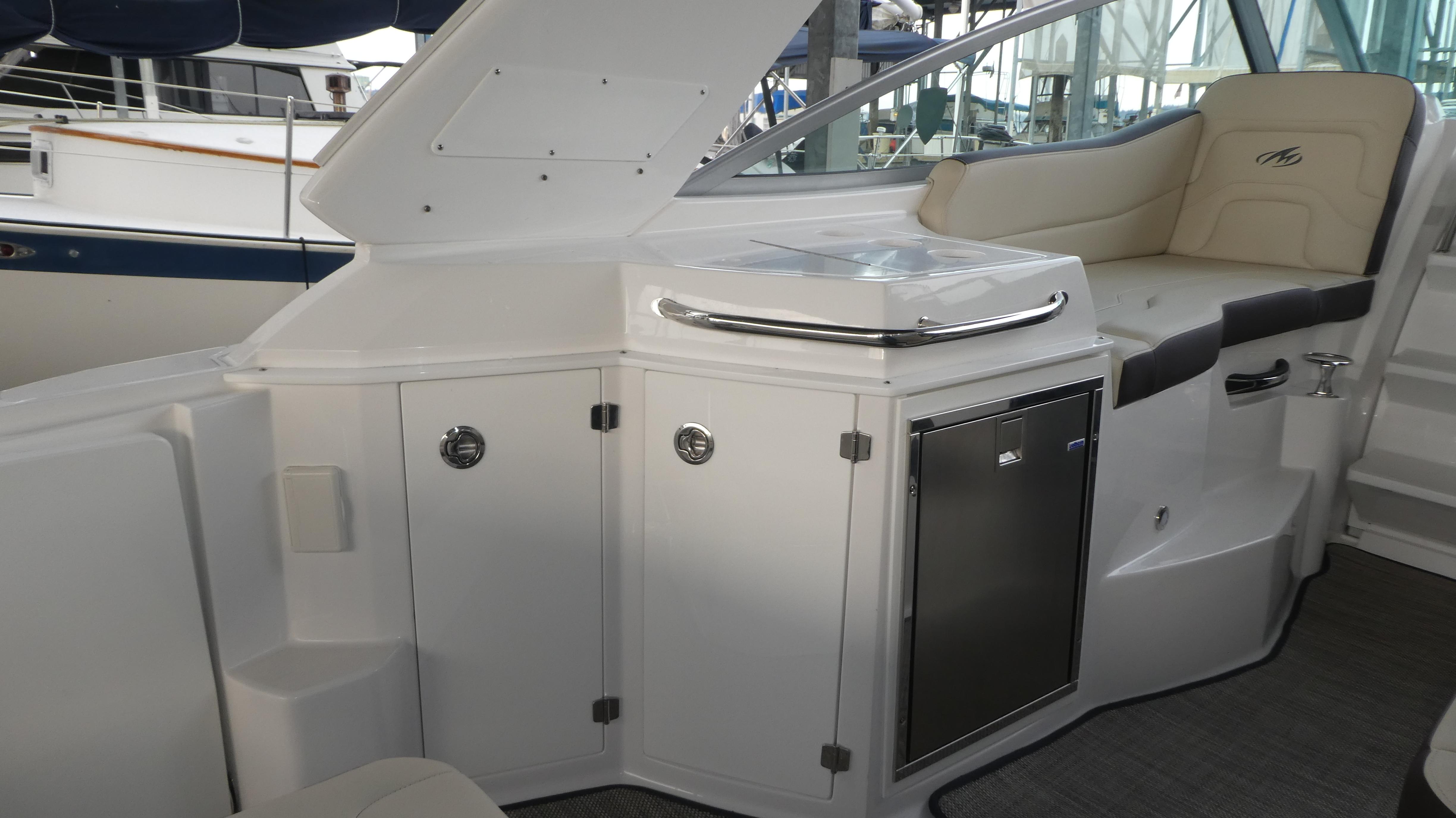 Interior of 2019 Monterey 295 Sport Yacht with seating area.