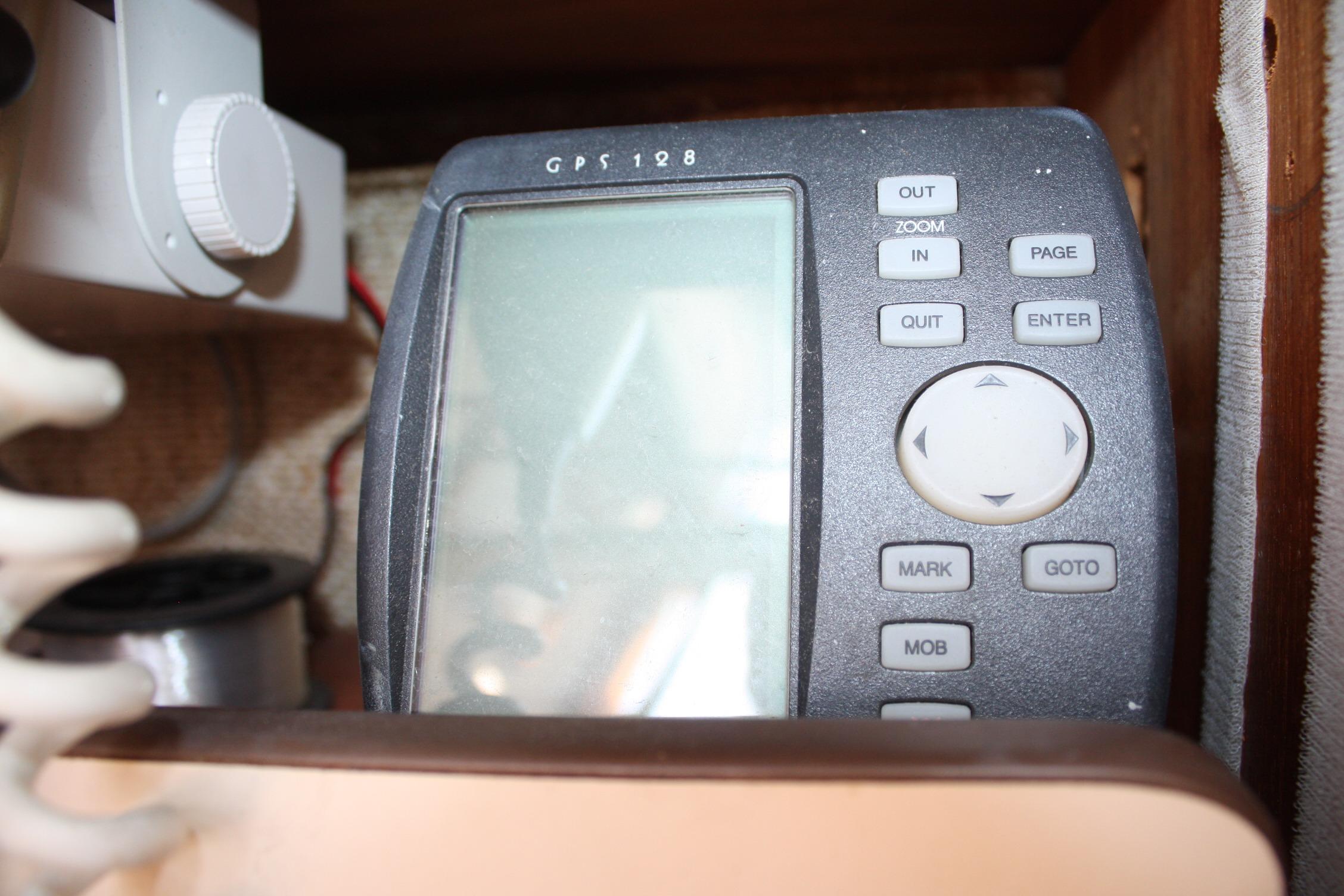 1981 S2 9.2A boat GPS device with navigation controls and display screen.