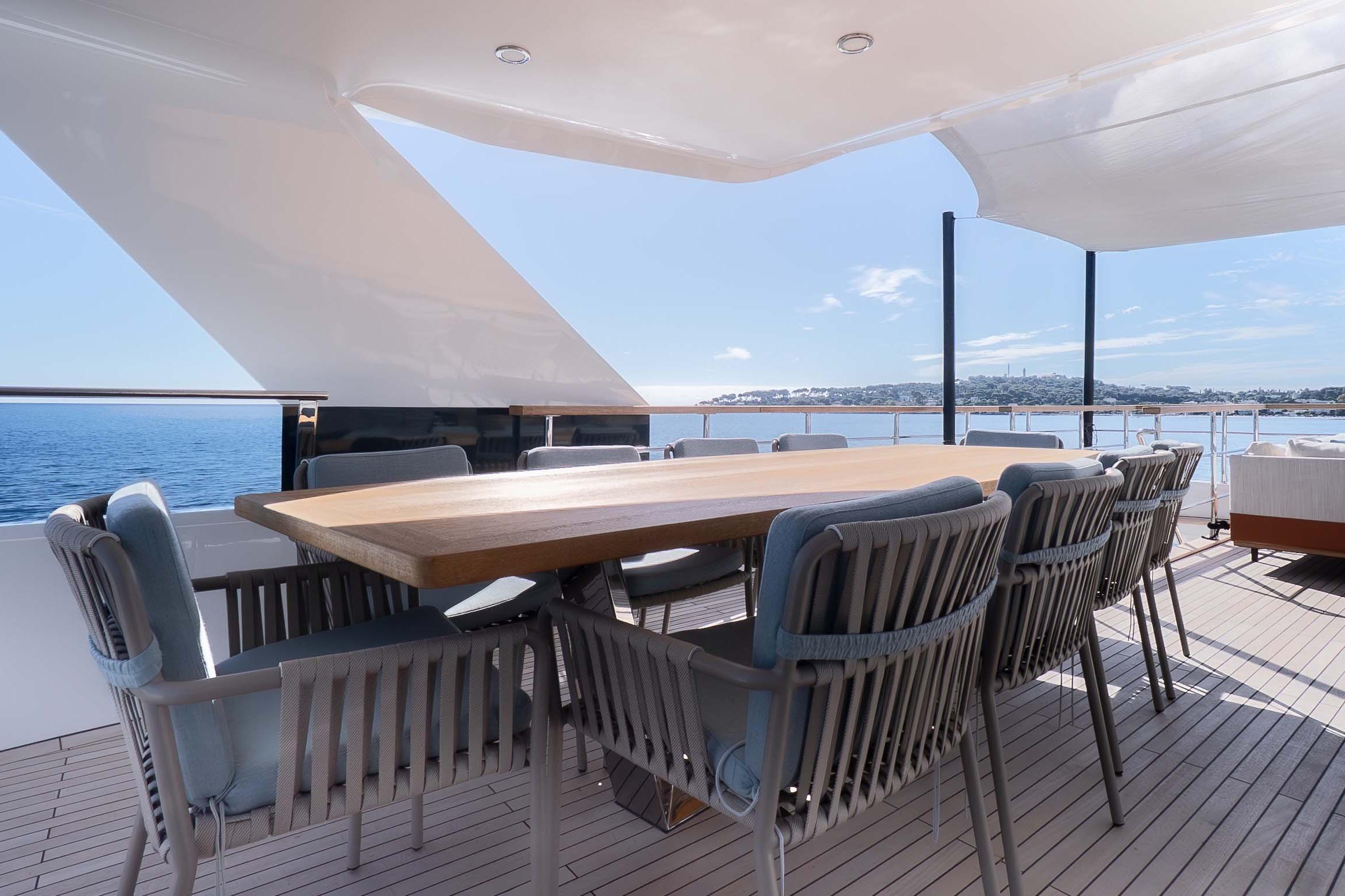 Luxury outdoor dining area on 2025 Numarine 32 XP yacht