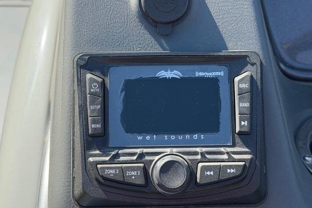 Control panel of a 2025 Ranger Reata 223C boat featuring Wet Sounds audio system.