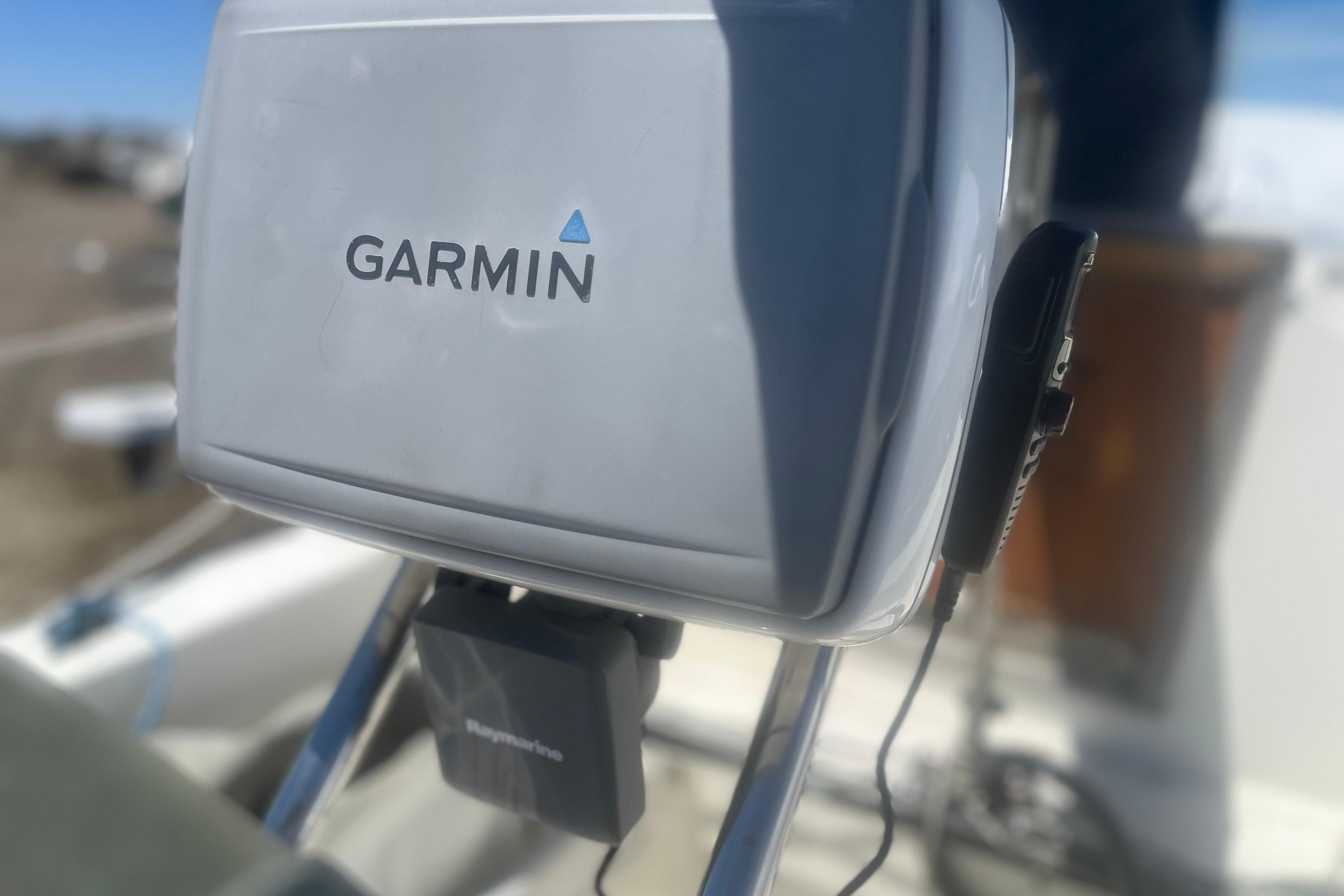 Garmin device on a 1972 C&C 30 sailboat, mounted with Raymarine equipment.