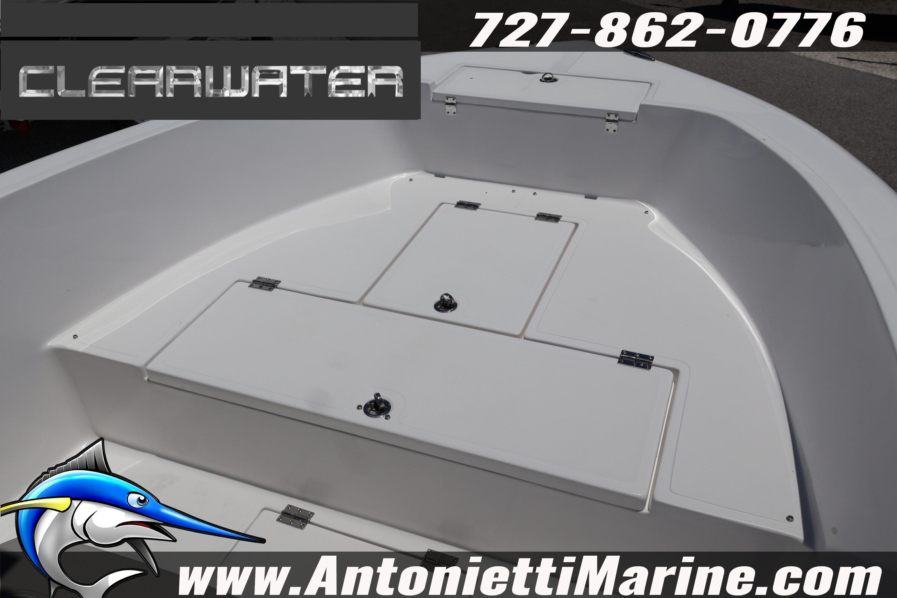 Clearwater 2000 Center Console boat, 2026 model, featuring storage compartments and contact details.