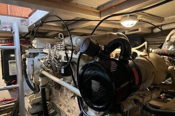 Engine room of 2000 Grand Banks 36 Classic yacht, showcasing detailed machinery and components.