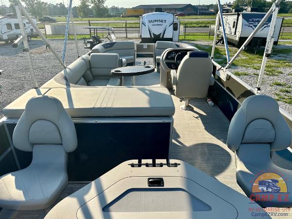 2025 South Bay 224FCR LE pontoon boat interior with seating and steering console.