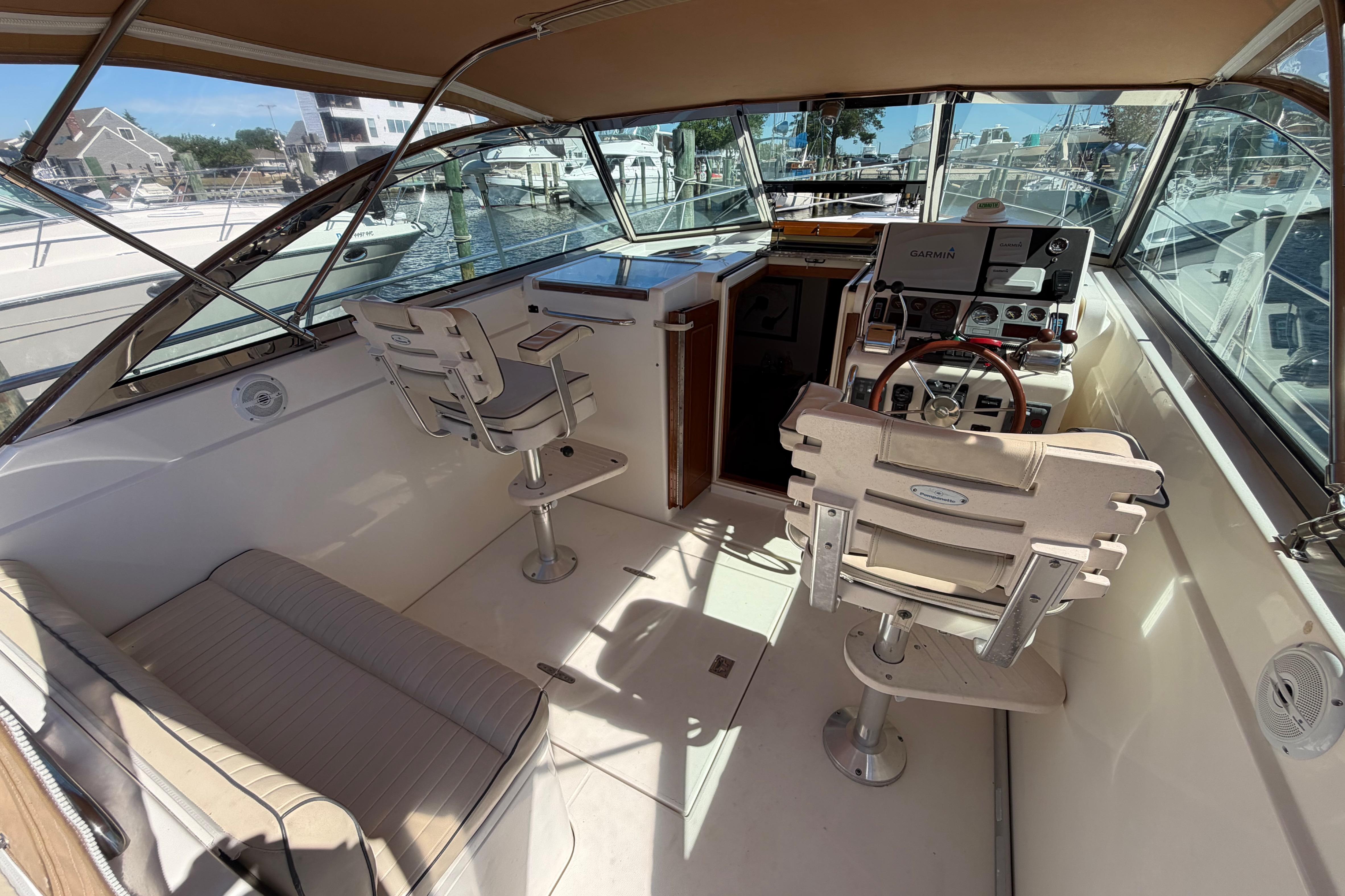 Interior of a 2000 Sabreline 36 Express boat with helm and seating area.