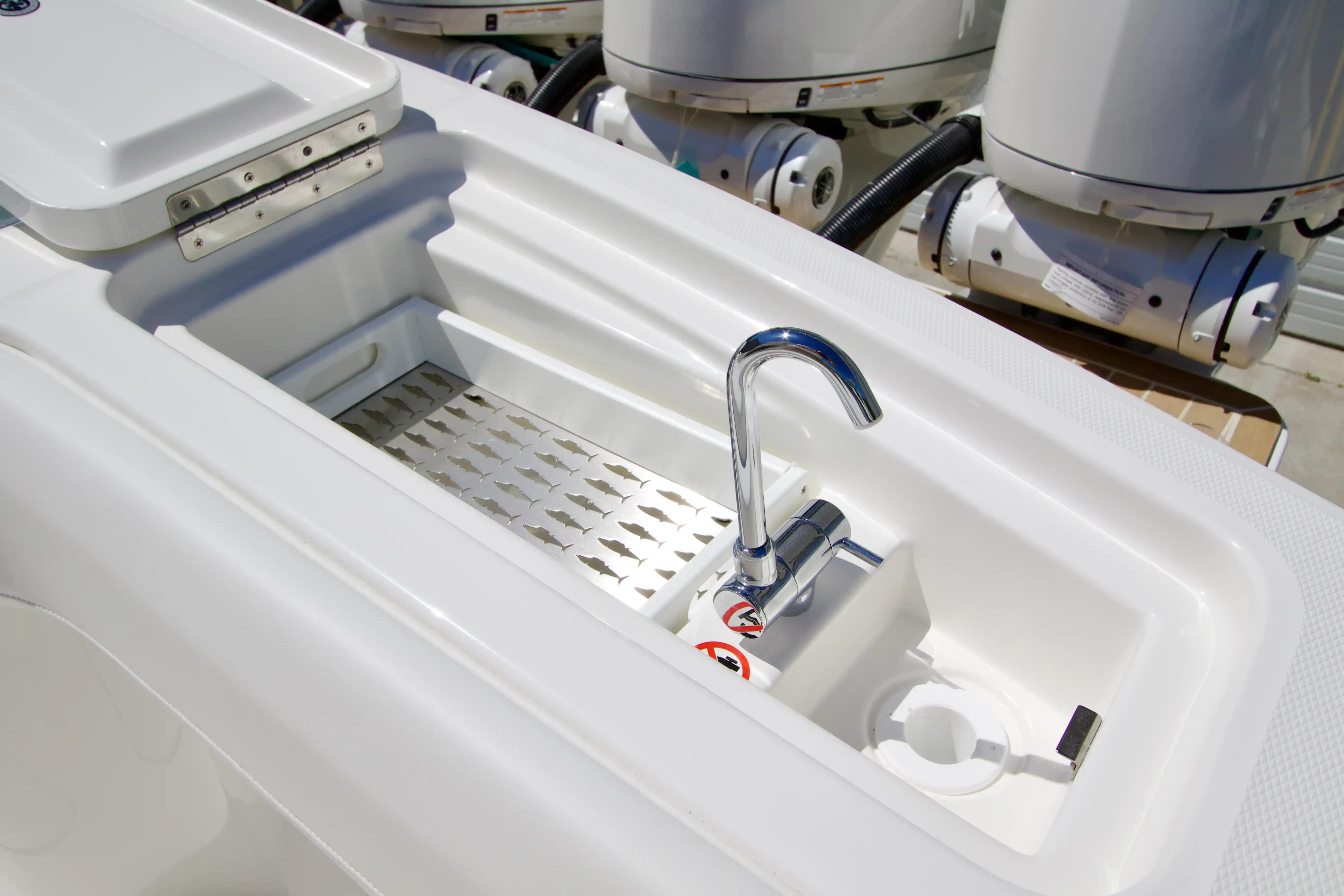 Luxury boat sink on 2027 Regulator 35 model, featuring sleek chrome faucet.
