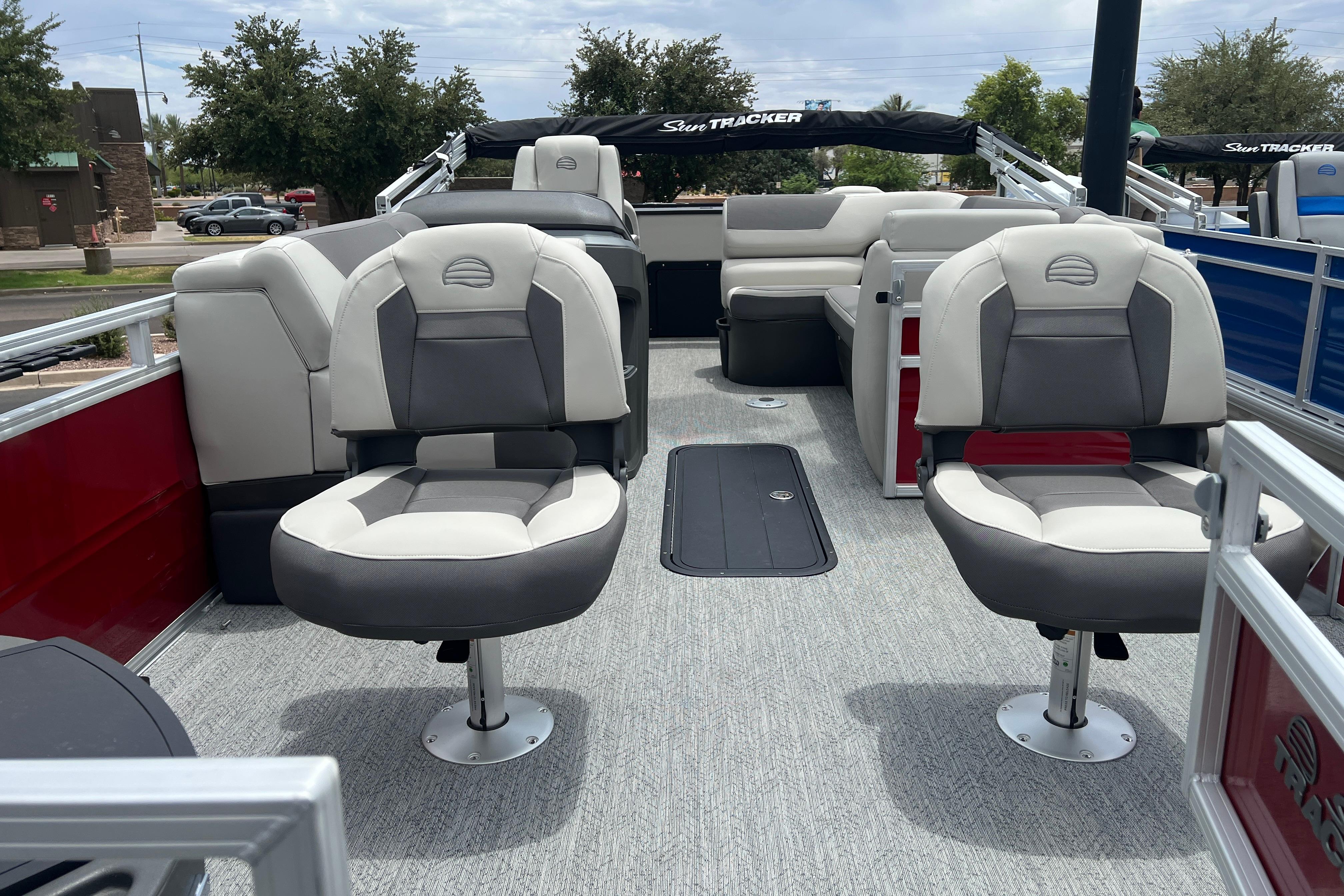 2026 Sun Tracker Fishin' Barge 22 XP3 interior with plush seating and modern design.