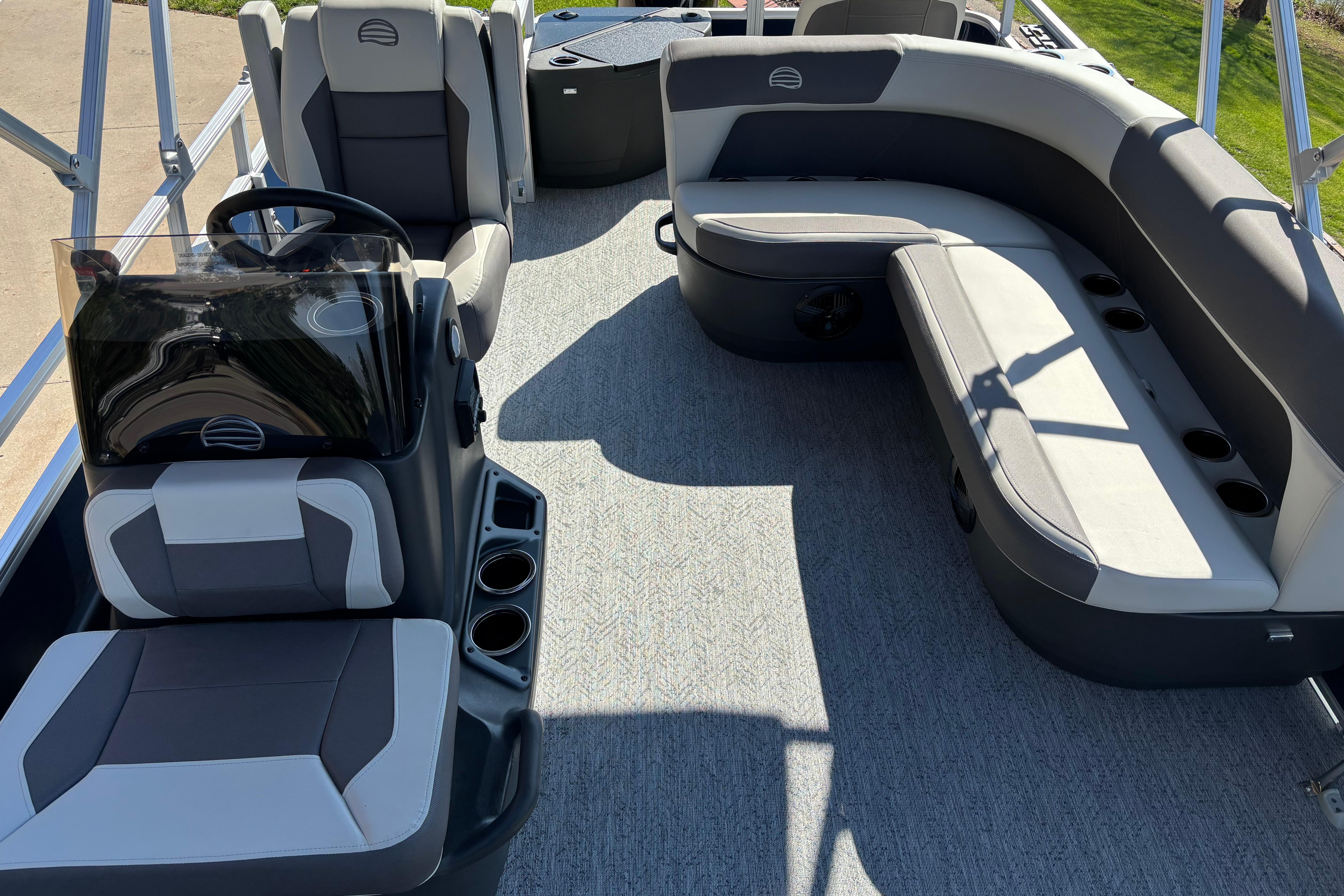 2026 Sun Tracker Bass Buggy 18 DLX interior with seating and steering console.