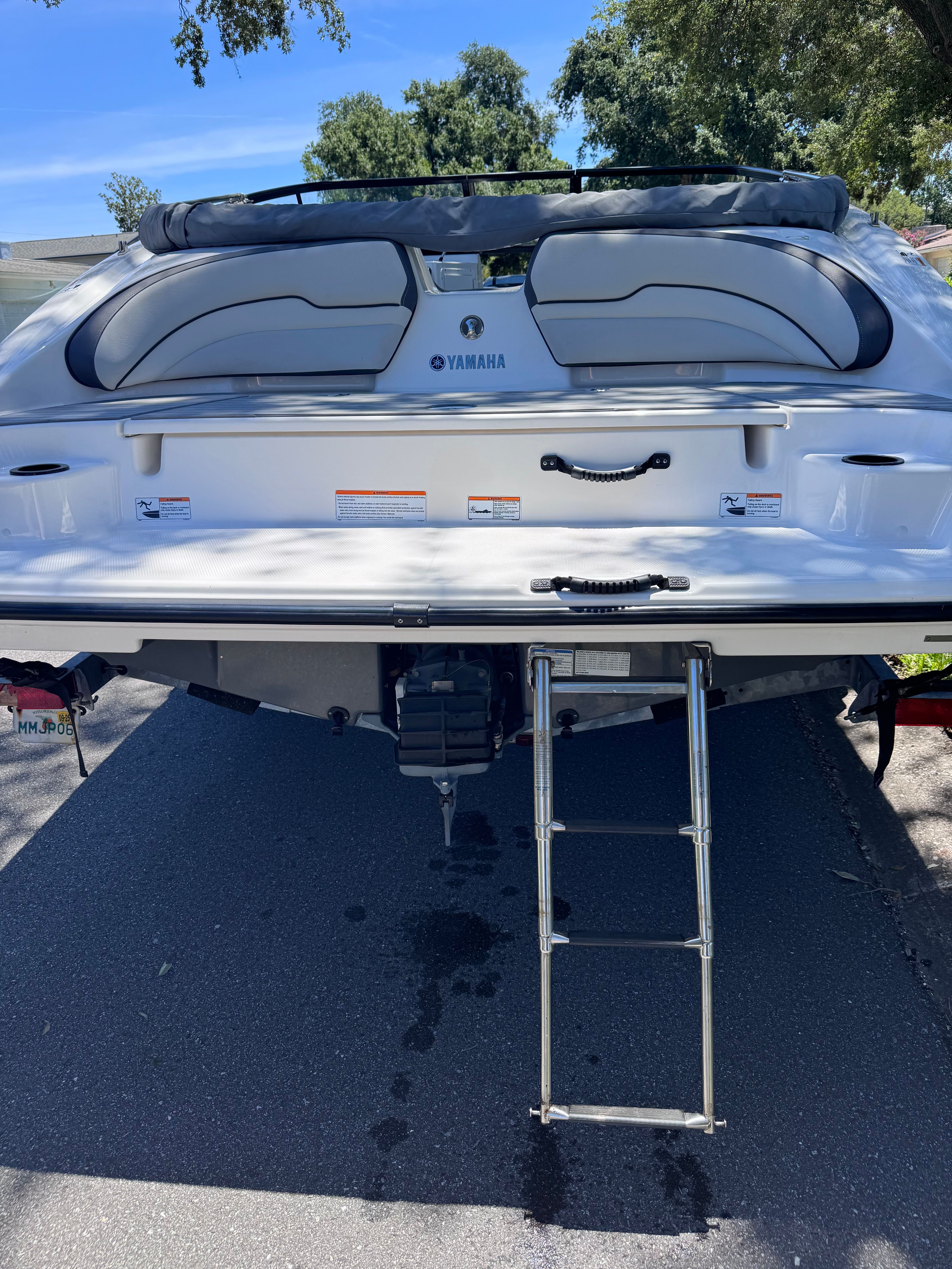 Rear view of a 2020 Yamaha SX190 boat with ladder.