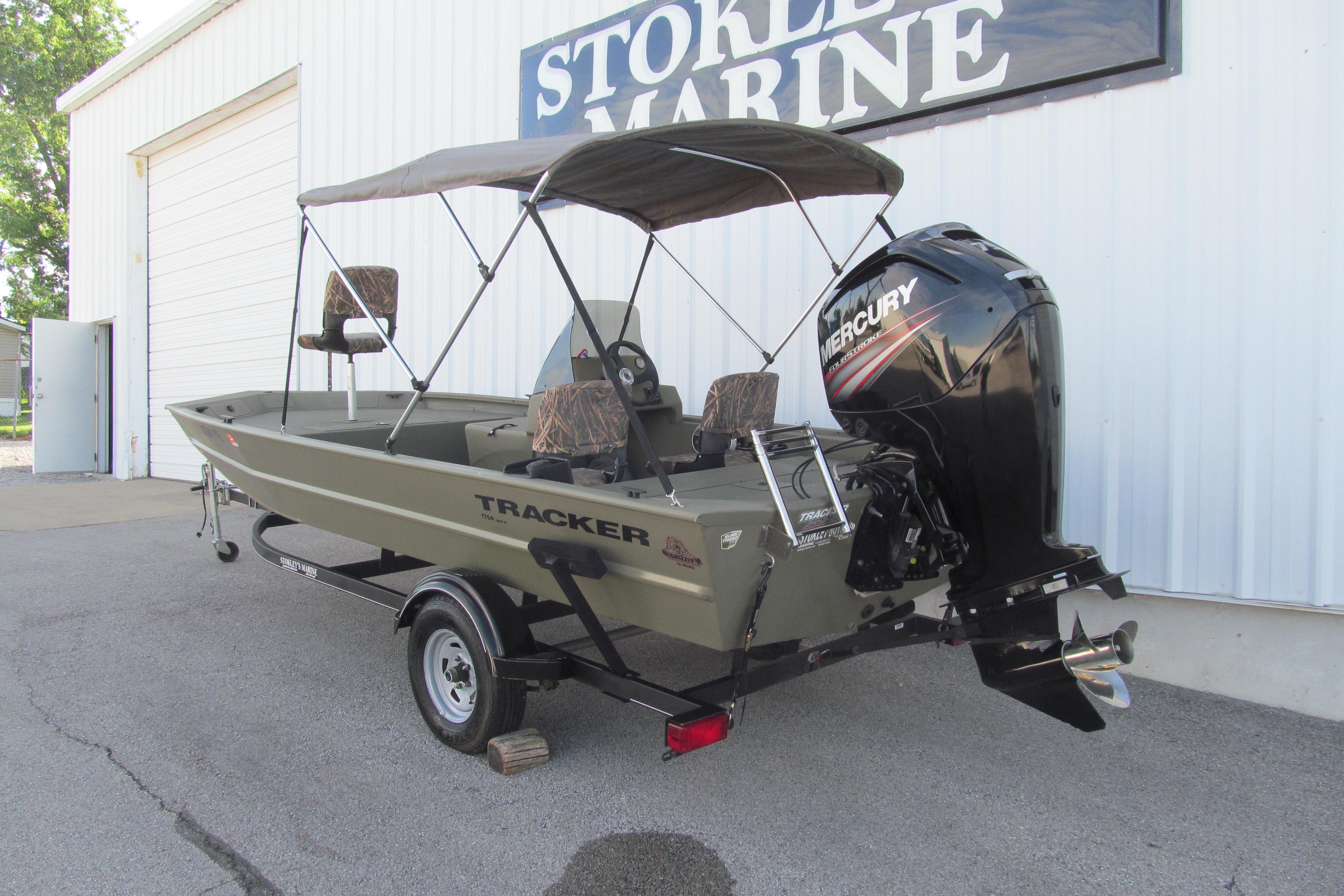 2018 Tracker Grizzly 1754 SC boat with Mercury engine, parked outside Stokley's Marine.