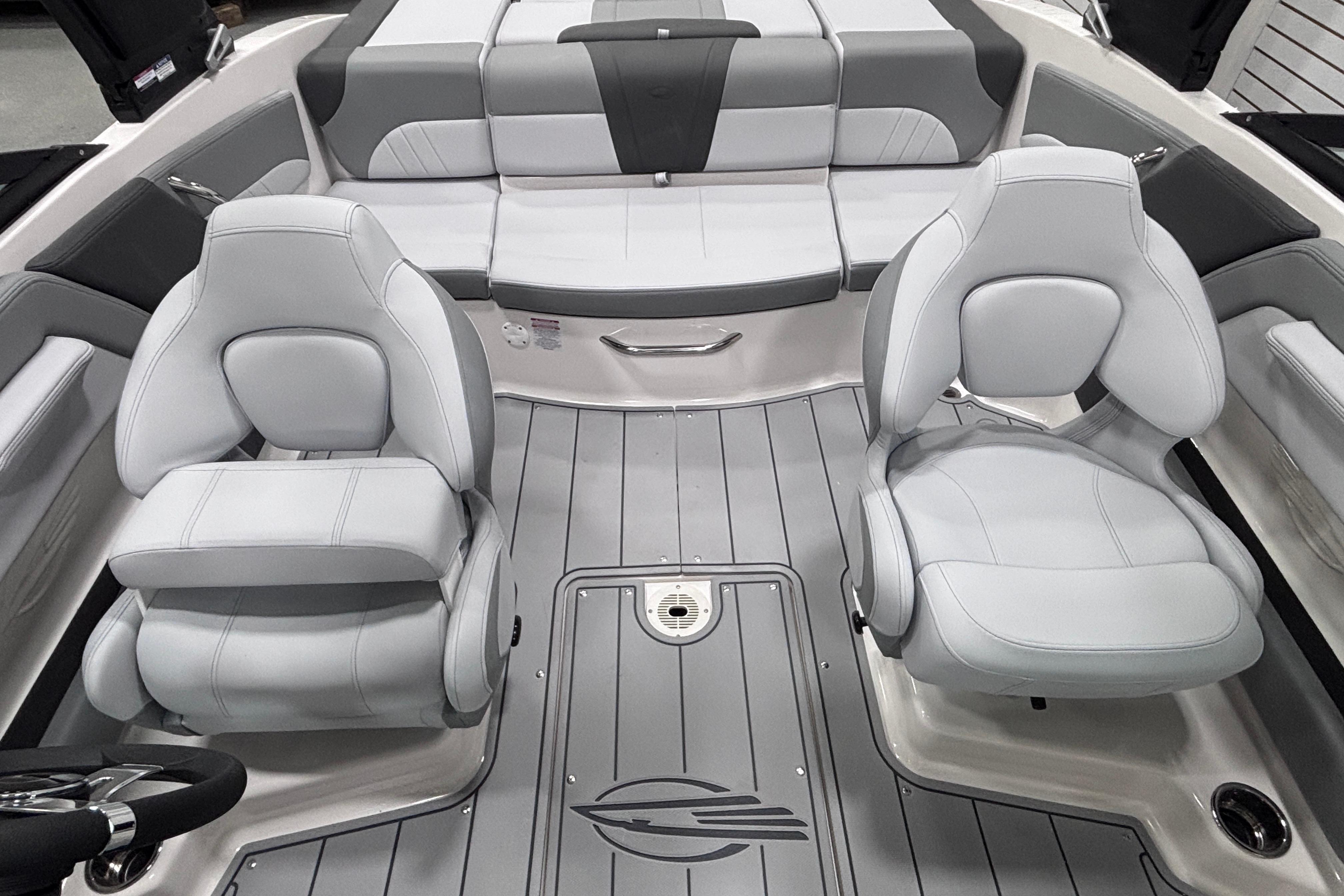 Interior of 2026 Chaparral 21 SSi boat with sleek gray seating and modern design.