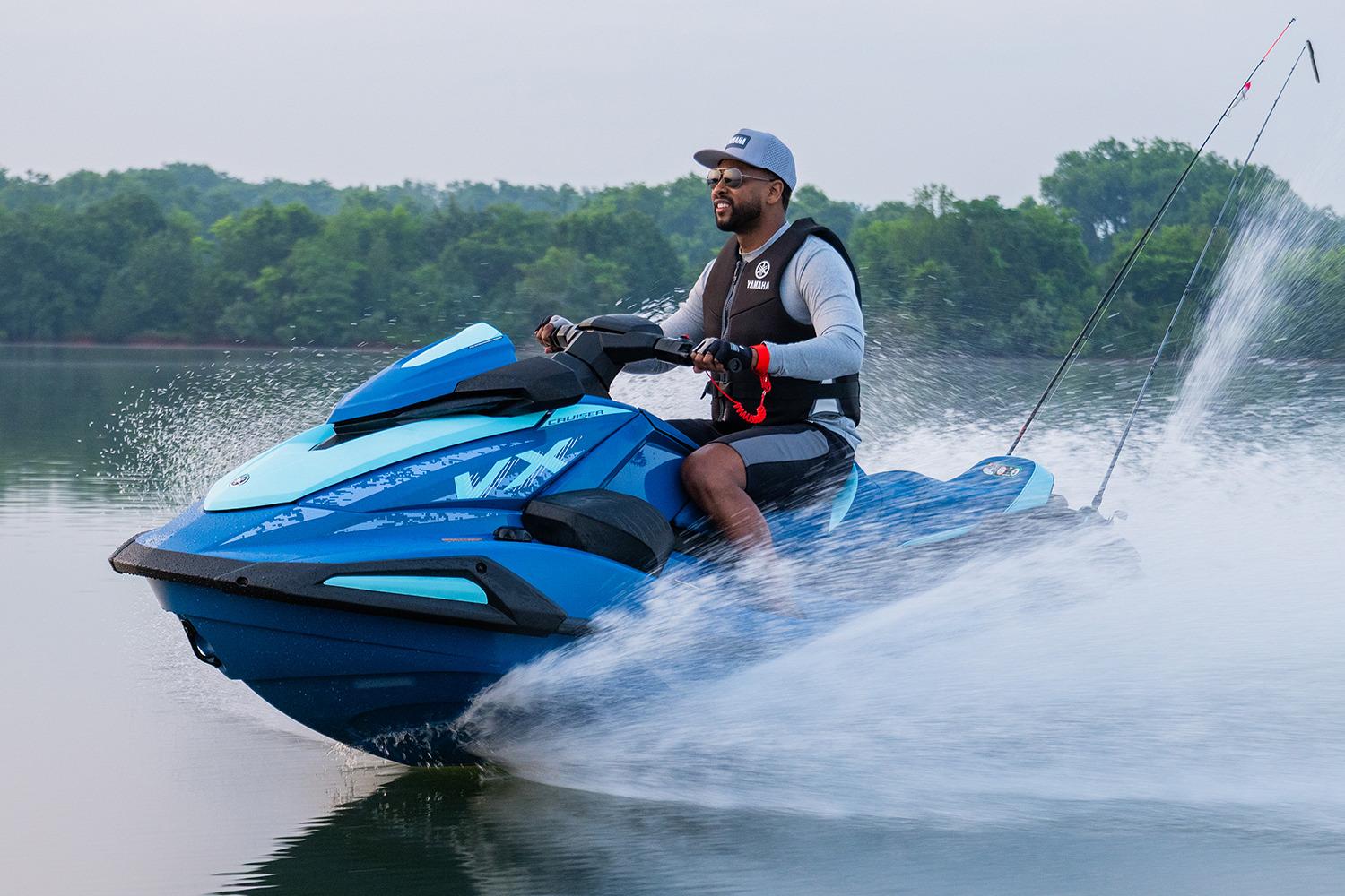Manufacturer Provided Image: 2026 Yamaha WaveRunner VX Cruiser speeding on a lake with a rider.