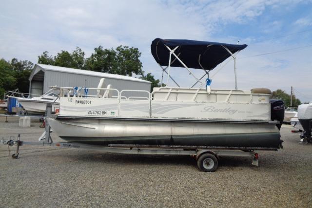 2008 Bentley Pontoons 200 CRUISE on trailer with canopy, parked outdoors.