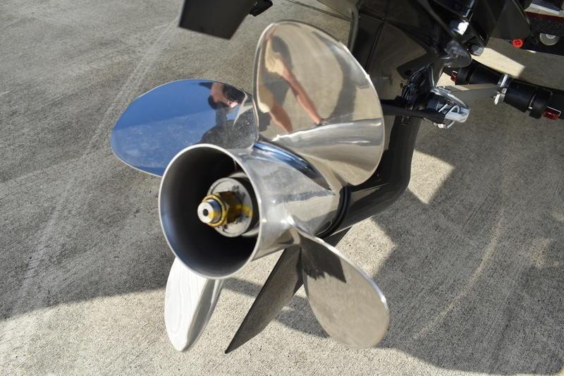2026 Triton 179 TrX boat propeller on concrete surface.