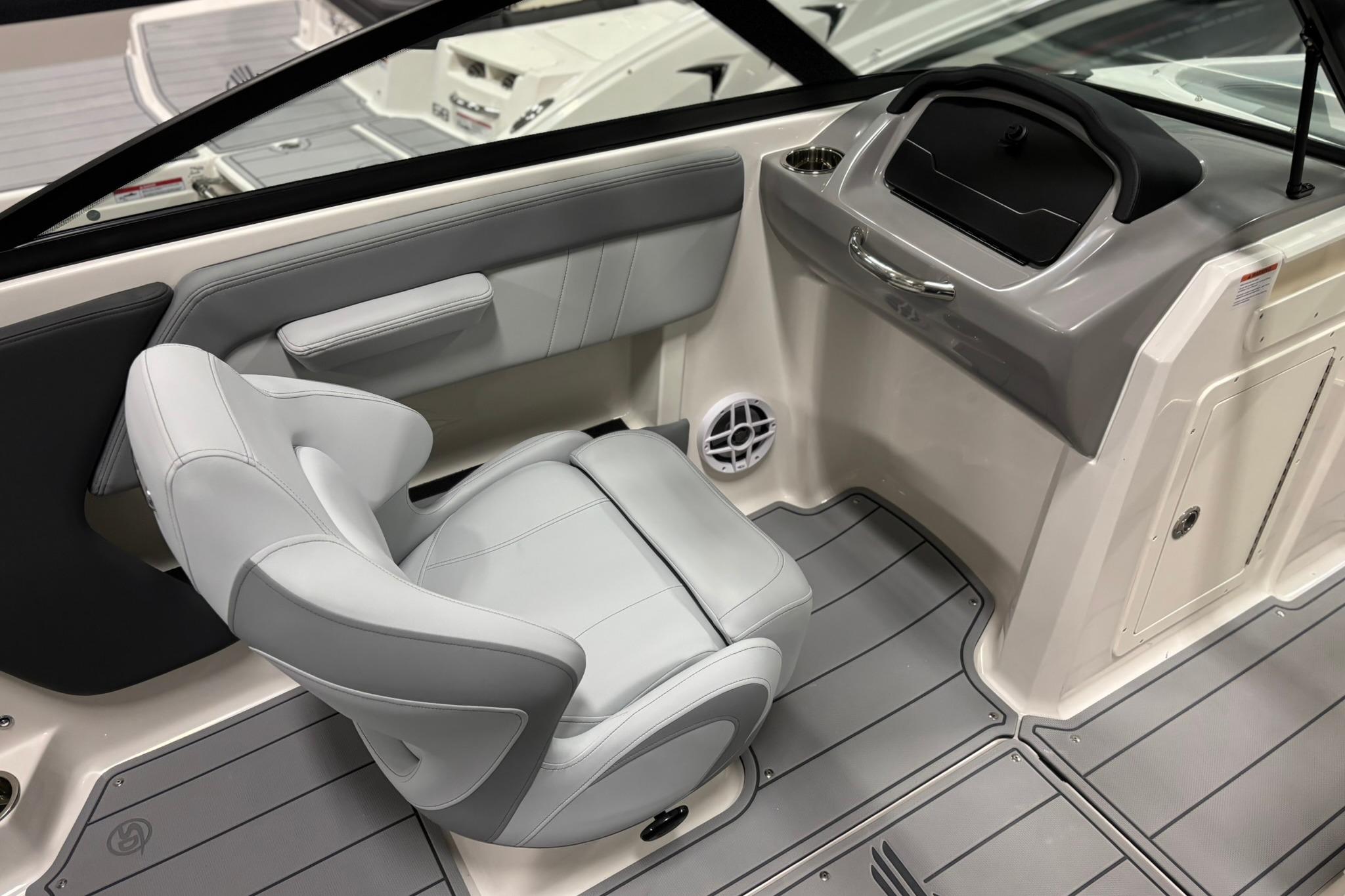 2026 Chaparral 21 SSi OB boat interior with sleek seating and modern dashboard design.