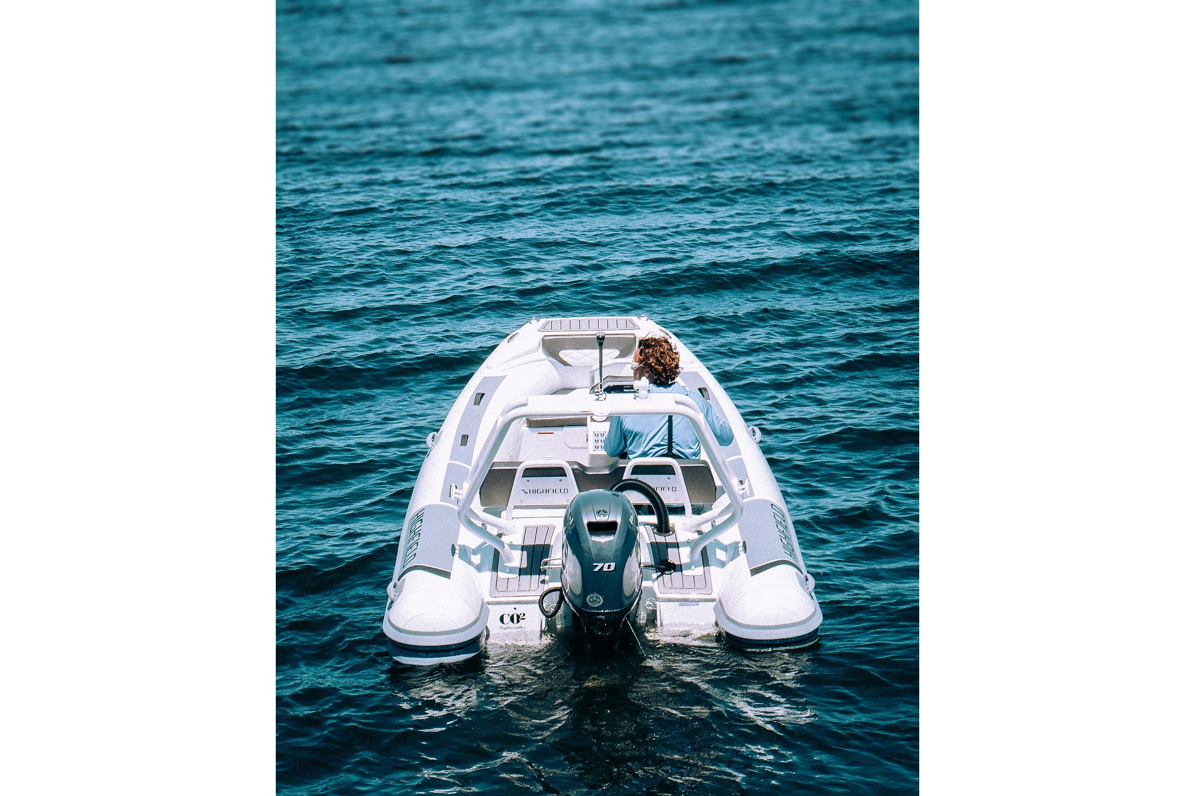 2026 Highfield Sport 420 boat cruising on open water.