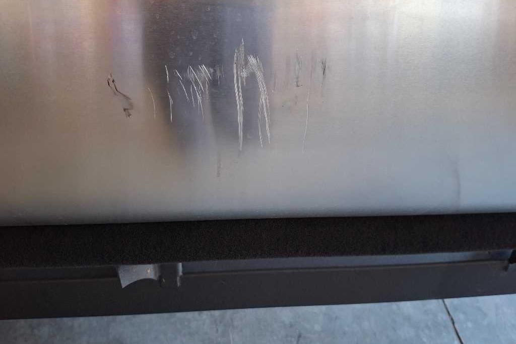 Scratches on 2026 Sun Tracker SportFish 20 DLX aluminum surface.