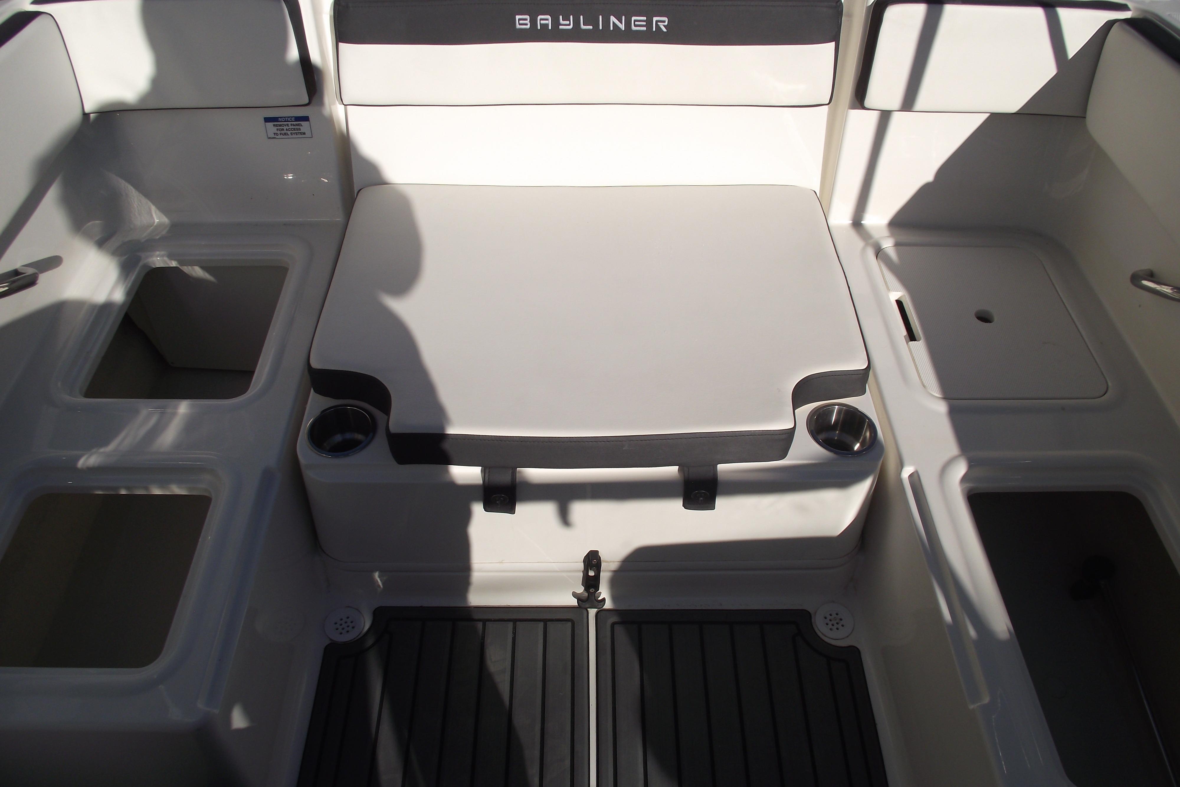 2022 Bayliner VR4 Bowrider OB interior with seating and storage compartments.