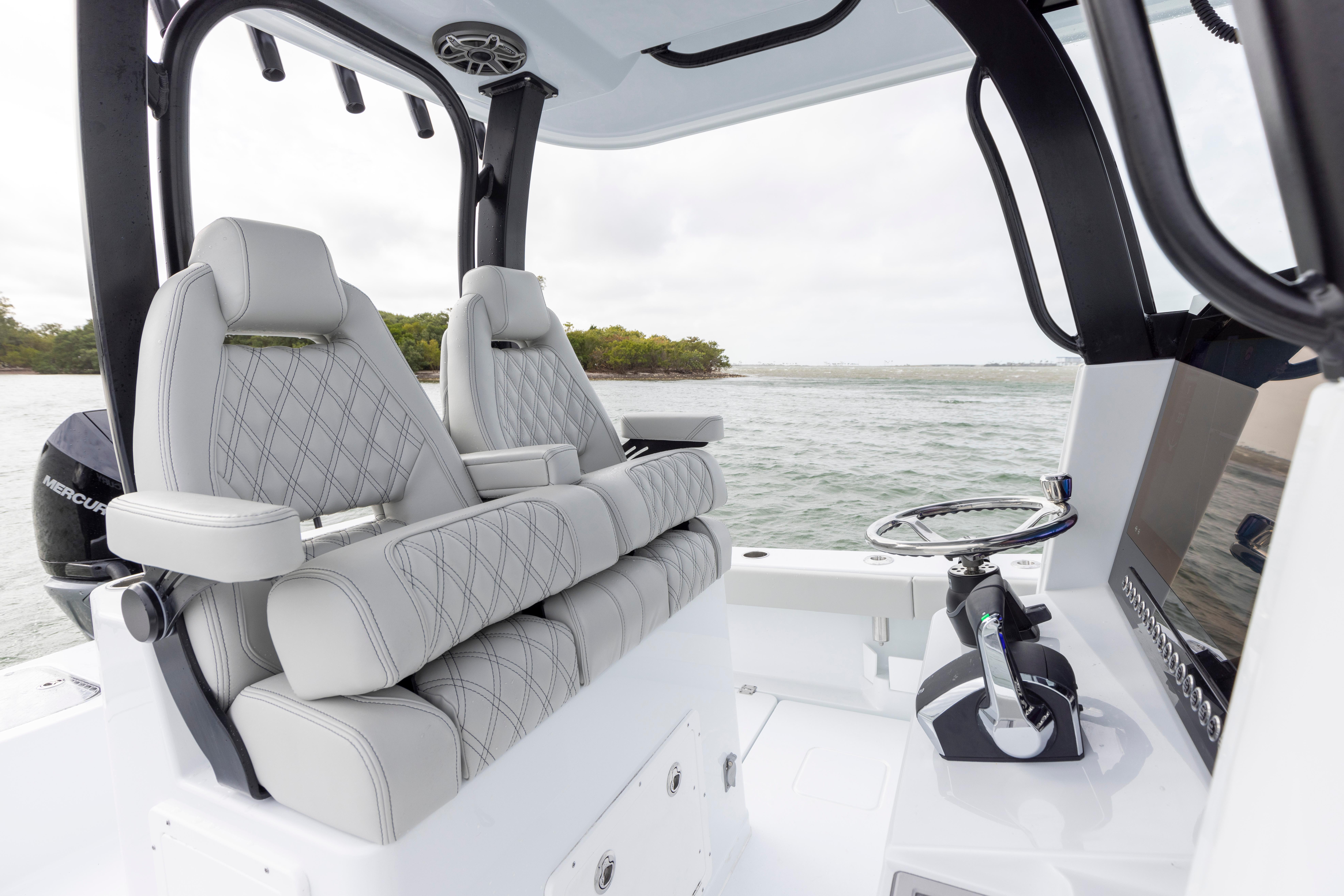 2024 Freeman 28 boat interior with luxury seating and modern controls.
