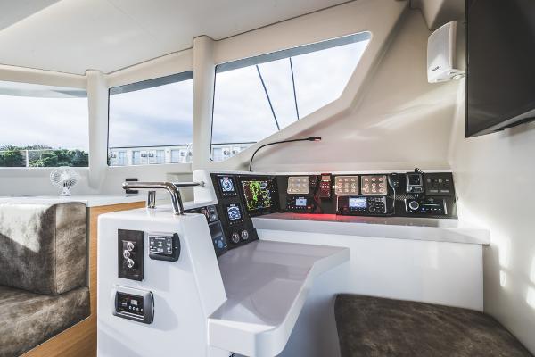 Modern Vision 444 yacht cockpit with advanced navigation controls, 2026 model.