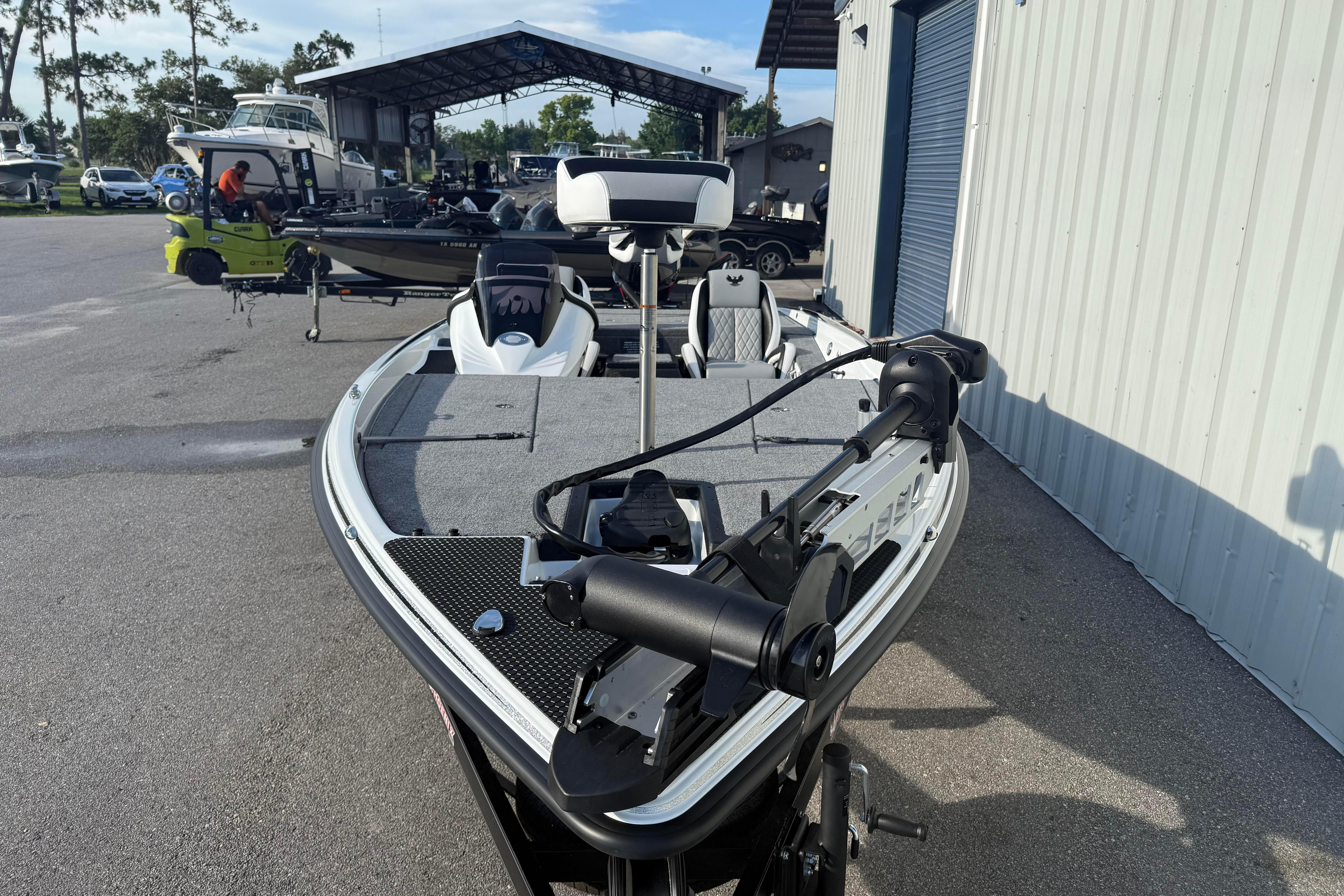 2027 Phoenix 721 ZXL boat parked outside a storage facility.