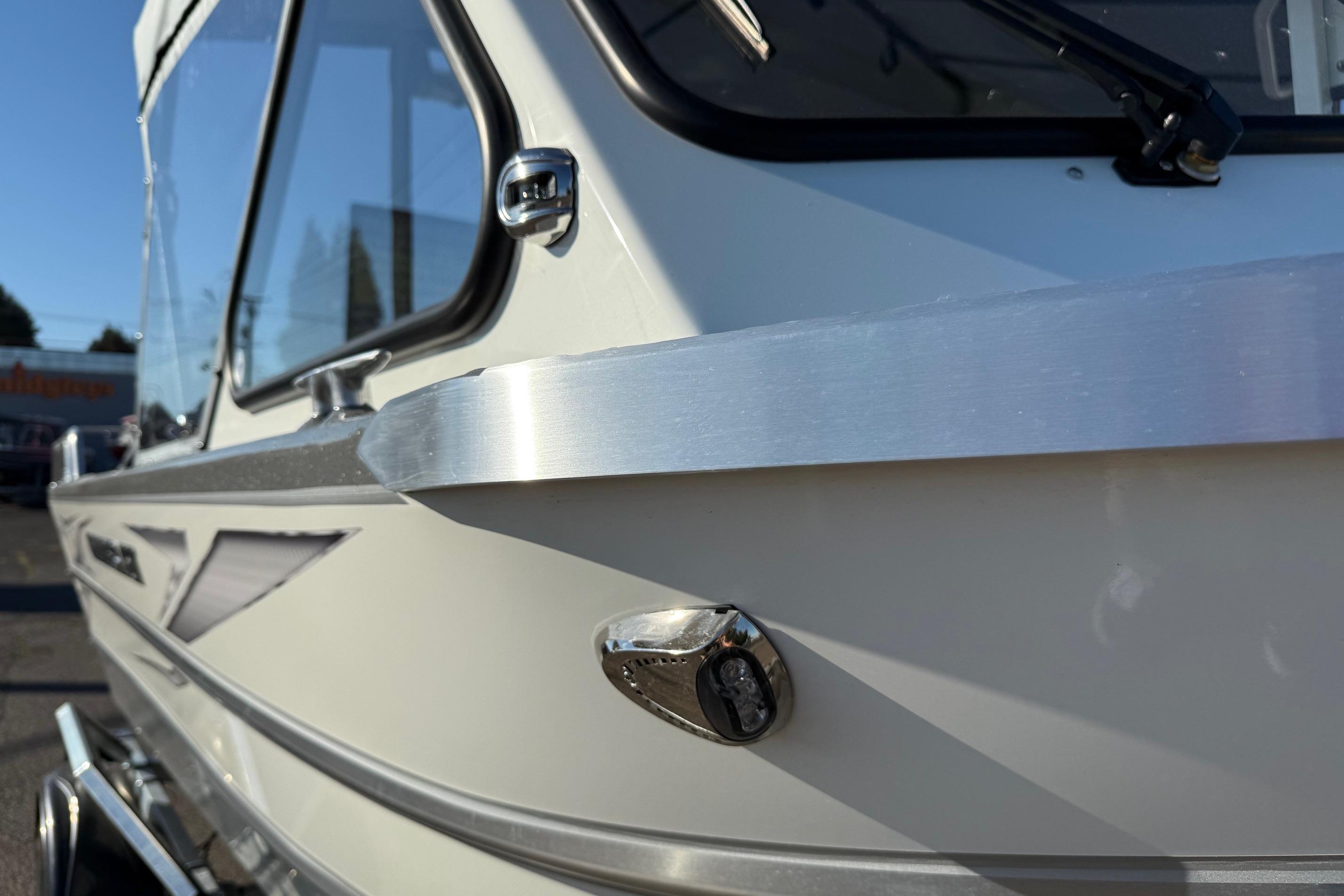 Close-up of 2026 Thunder Jet 185 Luxor boat exterior, showcasing sleek design and metallic finish.