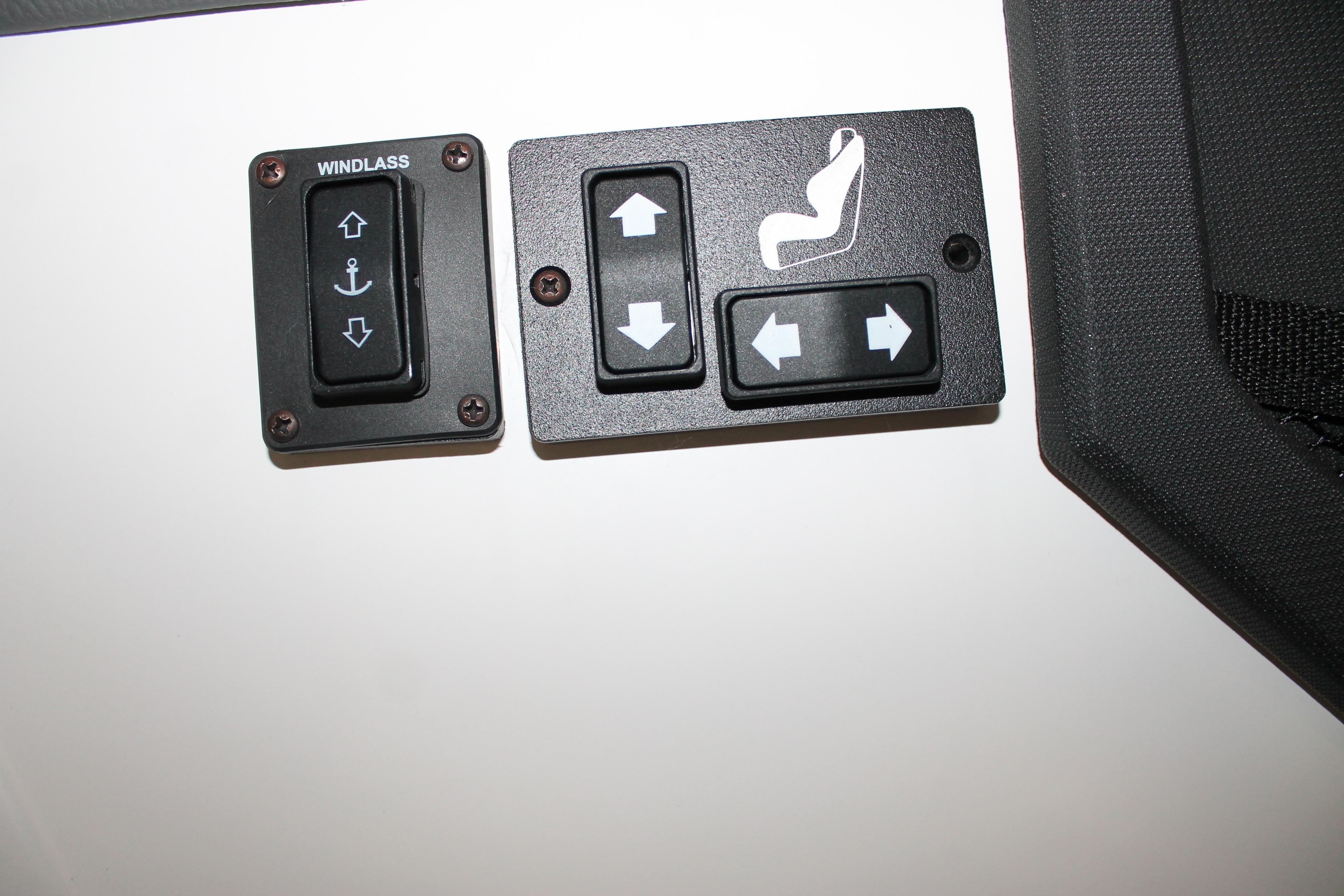 Control panel of 2023 Cobalt R8 with windlass and seat adjustment buttons.
