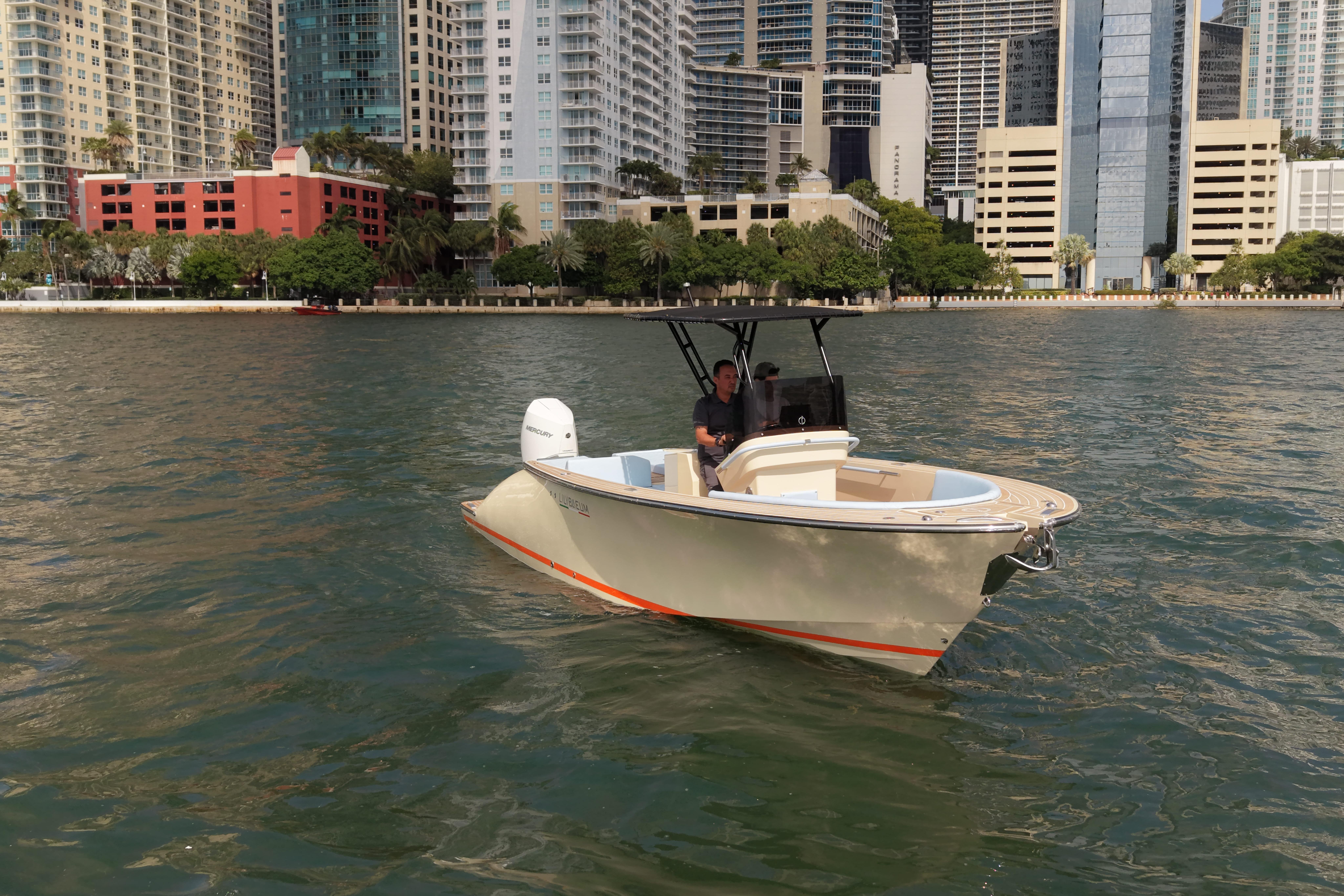 Lilybaeum Levanzo 25 boat cruising near urban waterfront, 2026 model.