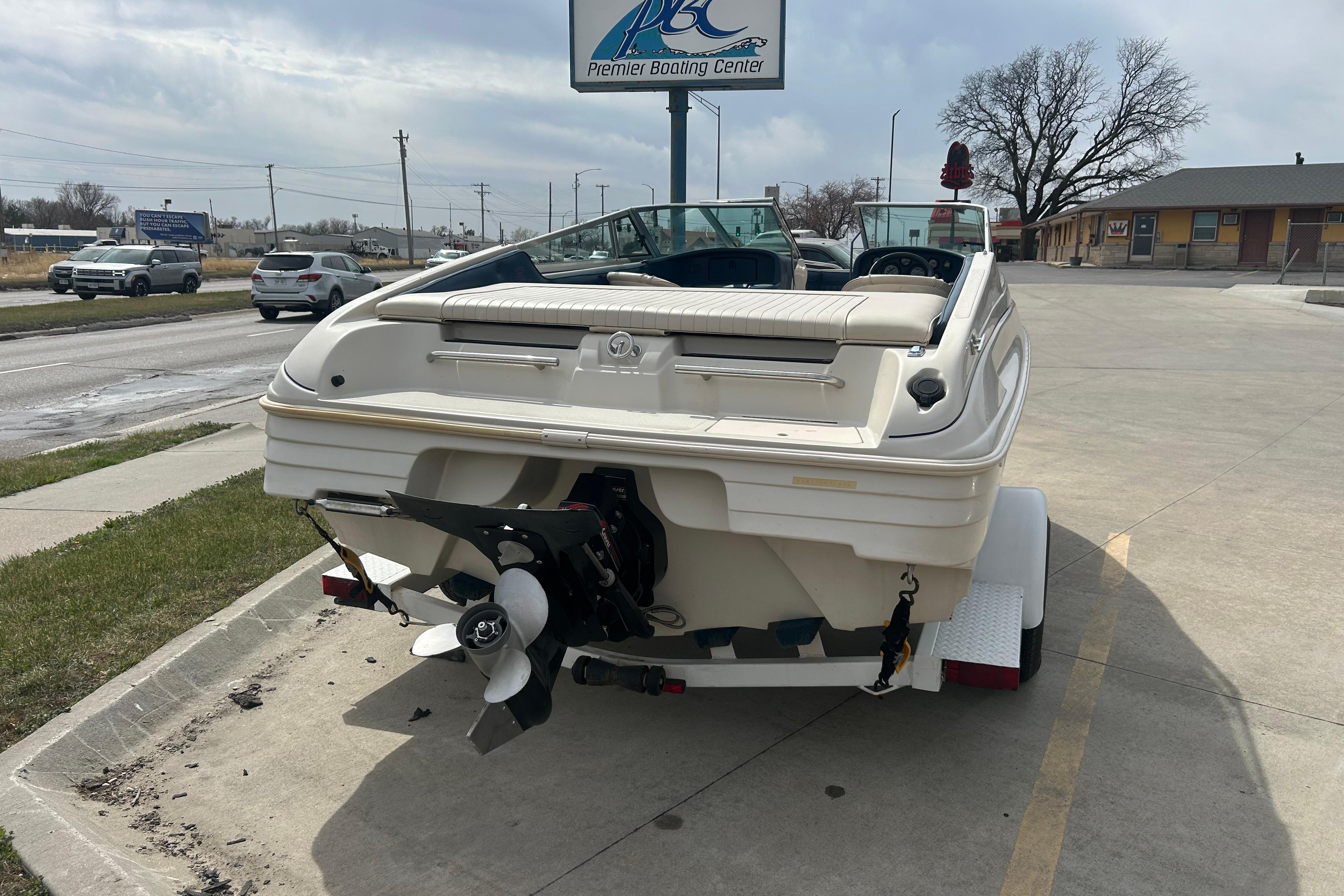 1996 Mariah 180 Shabah boat on trailer at Premier Boating Center parking lot.