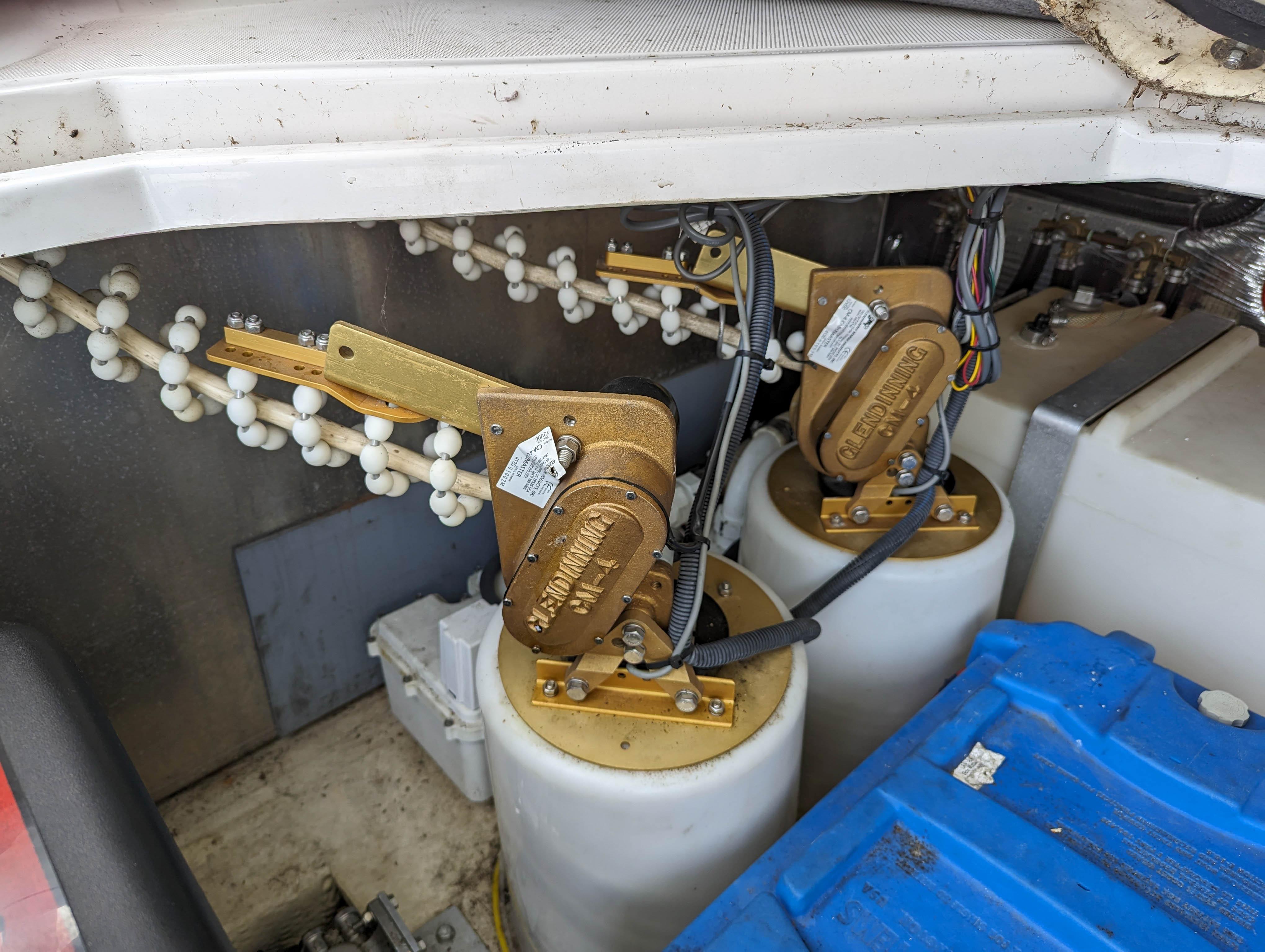 Engine room of 2006 Regal 3760 Sportyacht with hydraulic system.