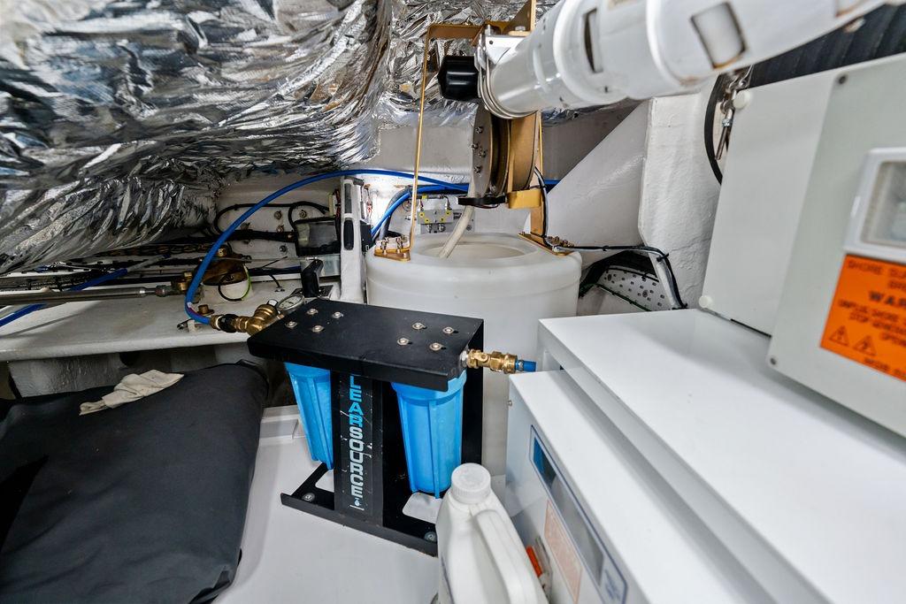 Engine room of 2020 Princess S62 yacht with mechanical equipment and insulation.