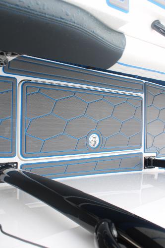 2024 Fountain 34 SC boat interior with hexagonal pattern and blue accents.