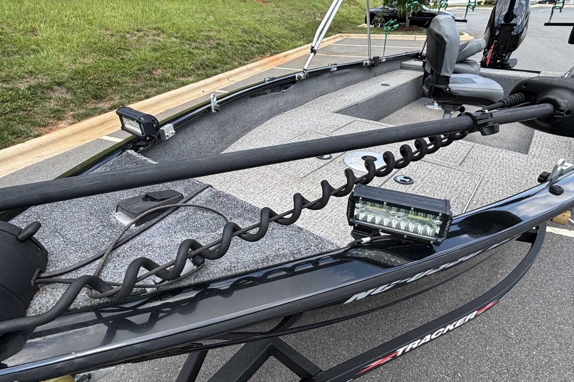 2022 Tracker Super Guide V-16 T boat with trolling motor and LED lights.