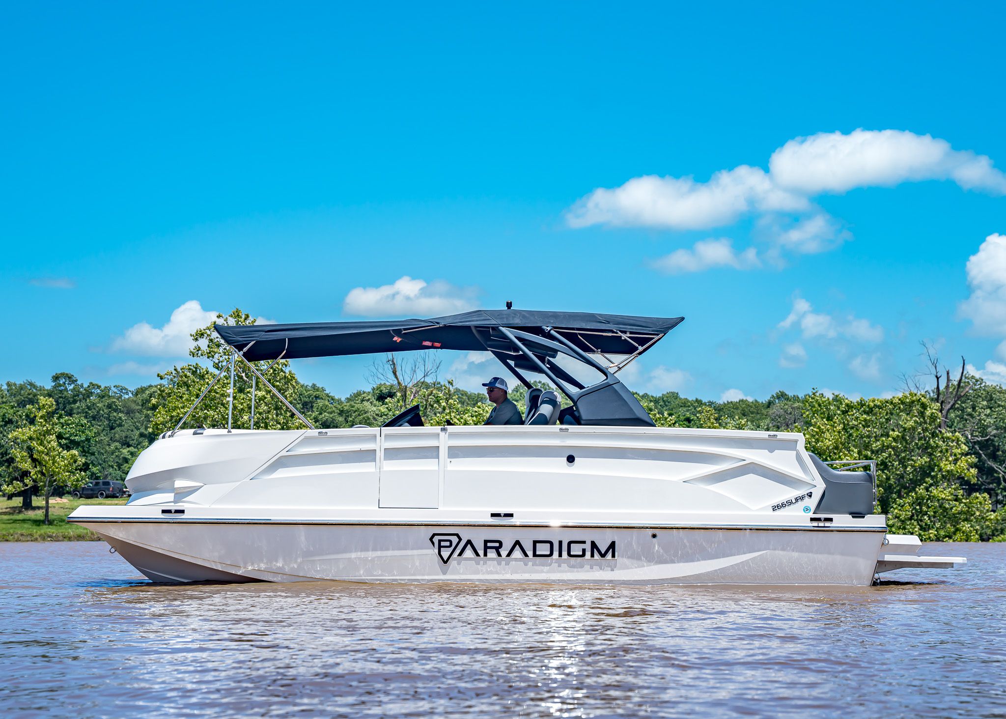 Paradigm 266 SL SURF boat 2025 on calm water.