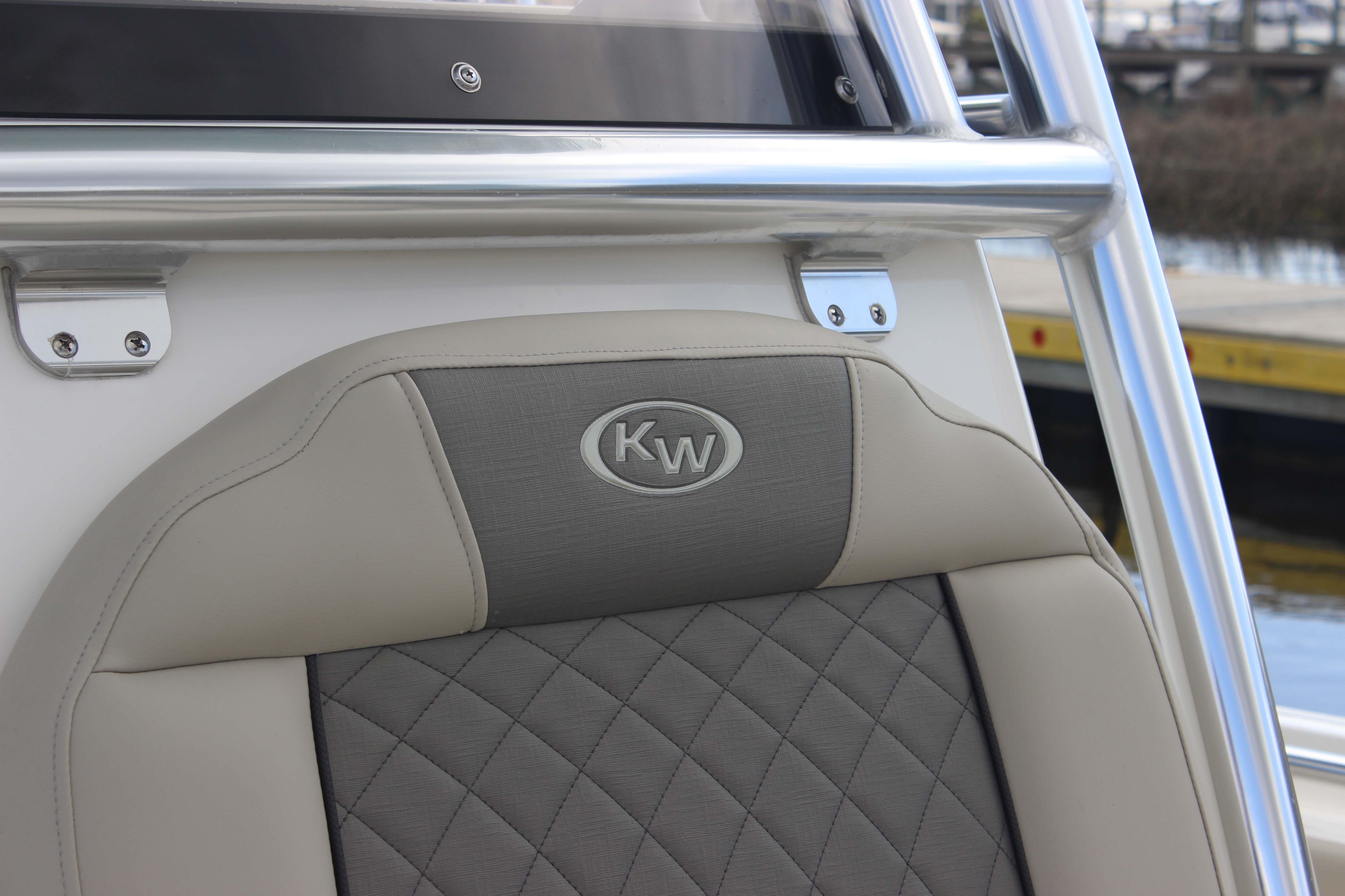 2026 Key West 219 FS boat seat with KW logo, featuring quilted upholstery.