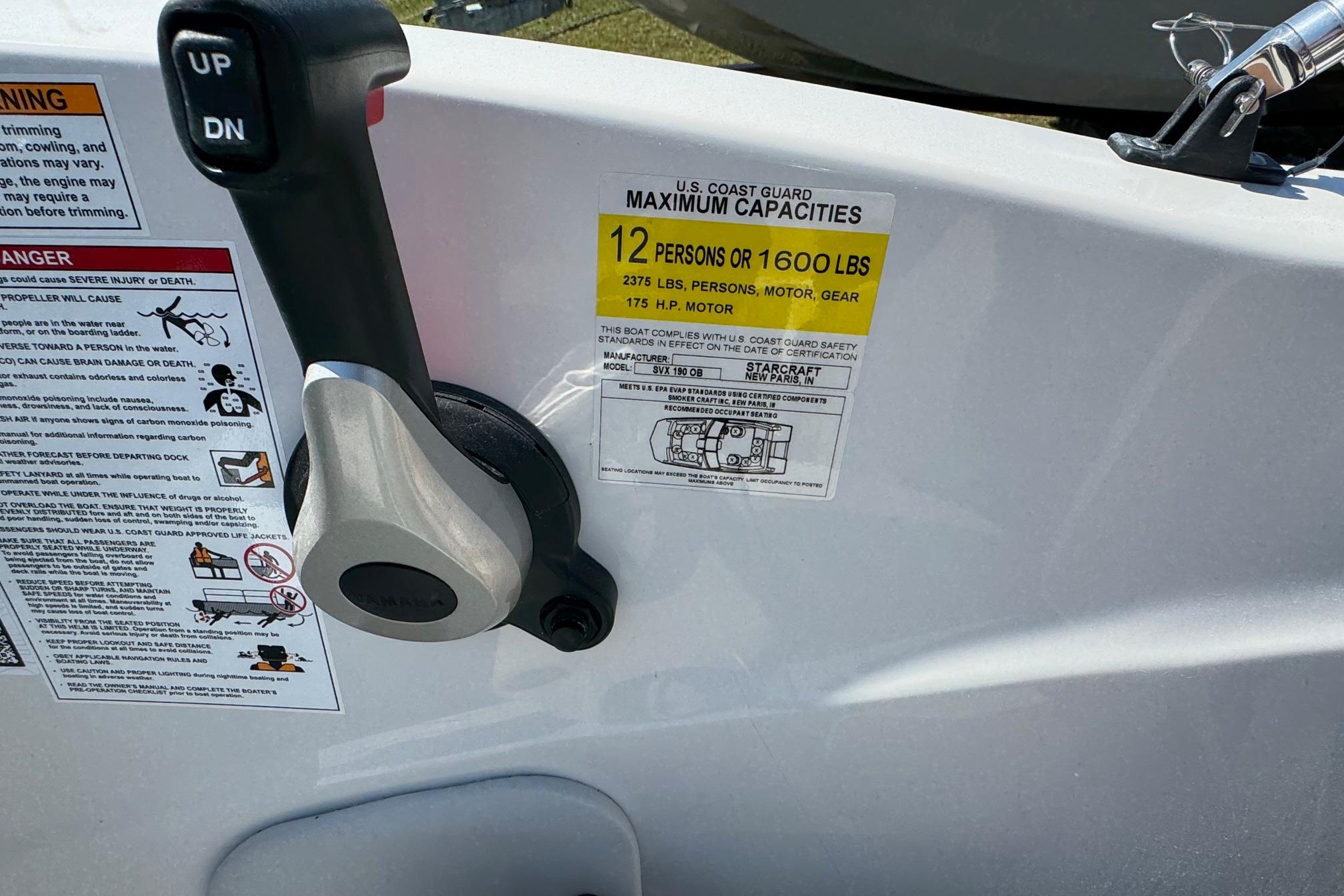 Control lever and capacity label on 2026 Starcraft SVX 190 OB boat.