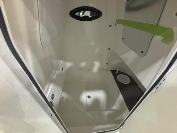 Interior cabin of 2025 Sea Pro 262 Offshore boat, featuring sleek white design.