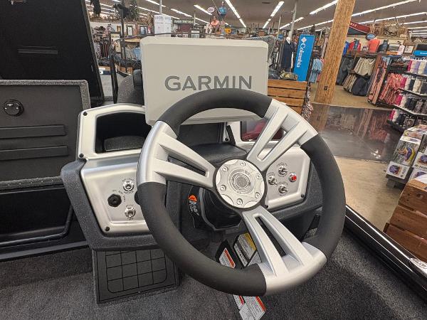 Steering wheel and Garmin display in 2025 Tracker Savage 215 boat.
