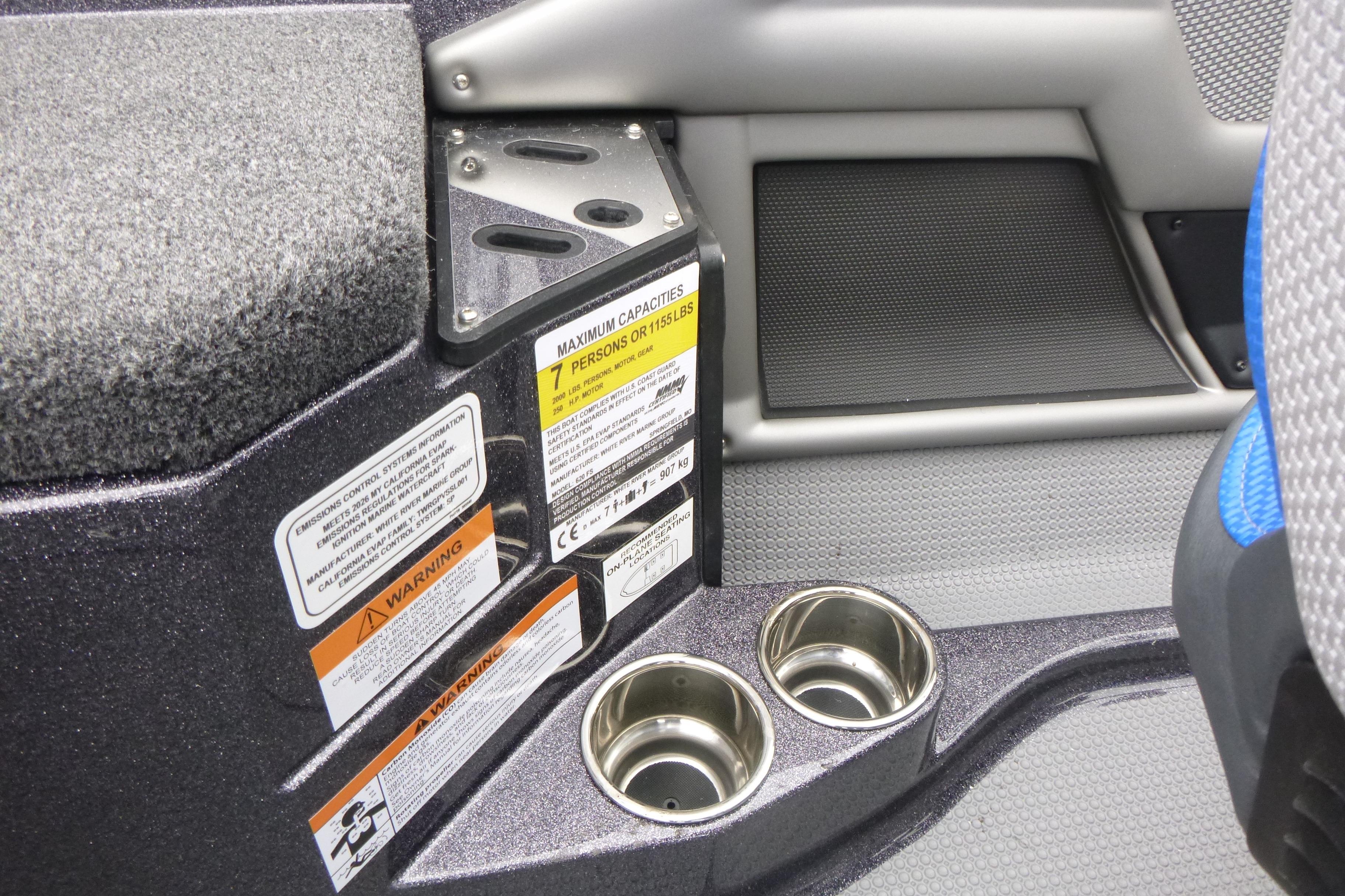 2026 Ranger 620FS Cup Equipped boat interior with cup holders and safety labels.