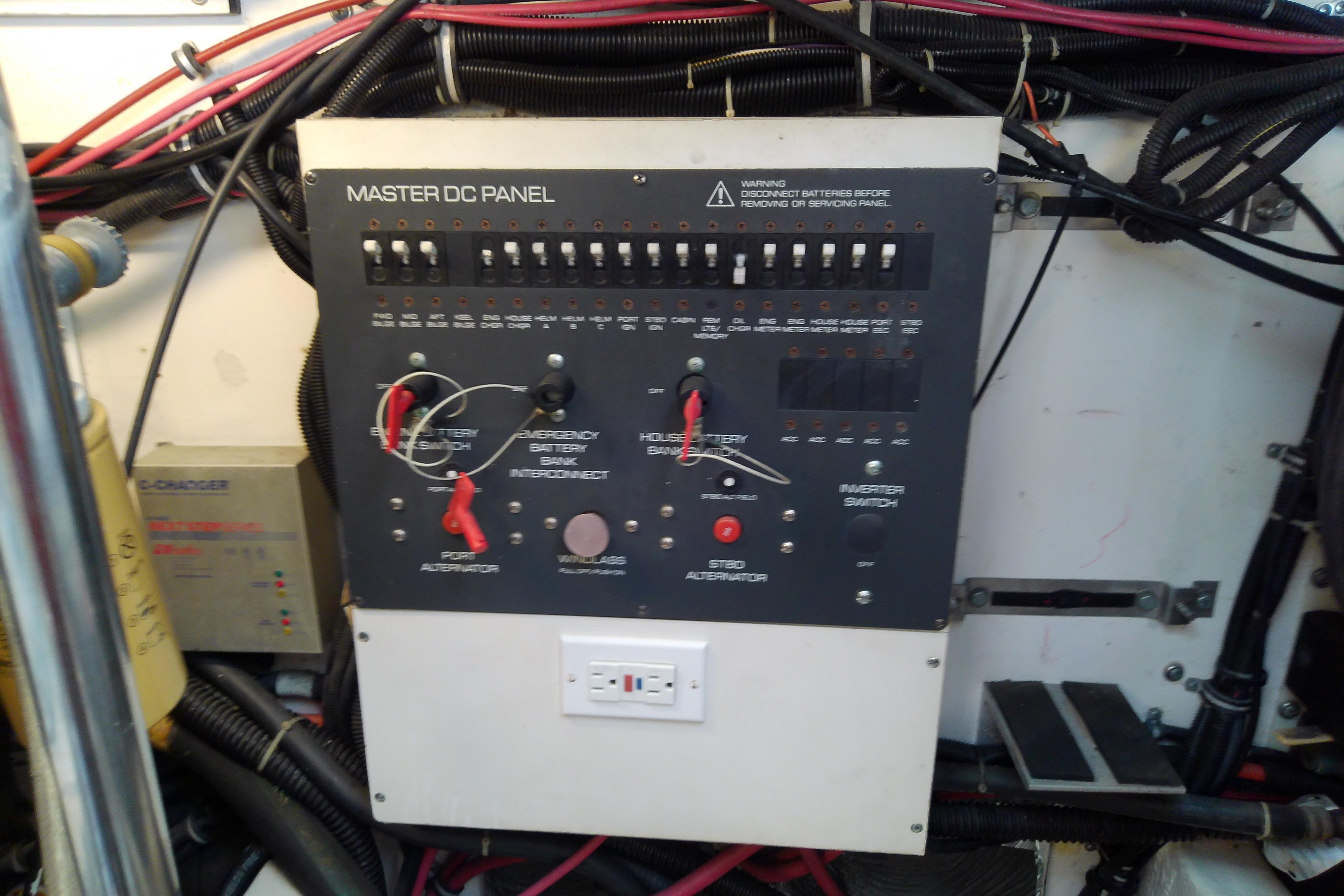 Master DC panel on a 2000 Tiara Yachts 4100 Open, featuring switches and wiring.