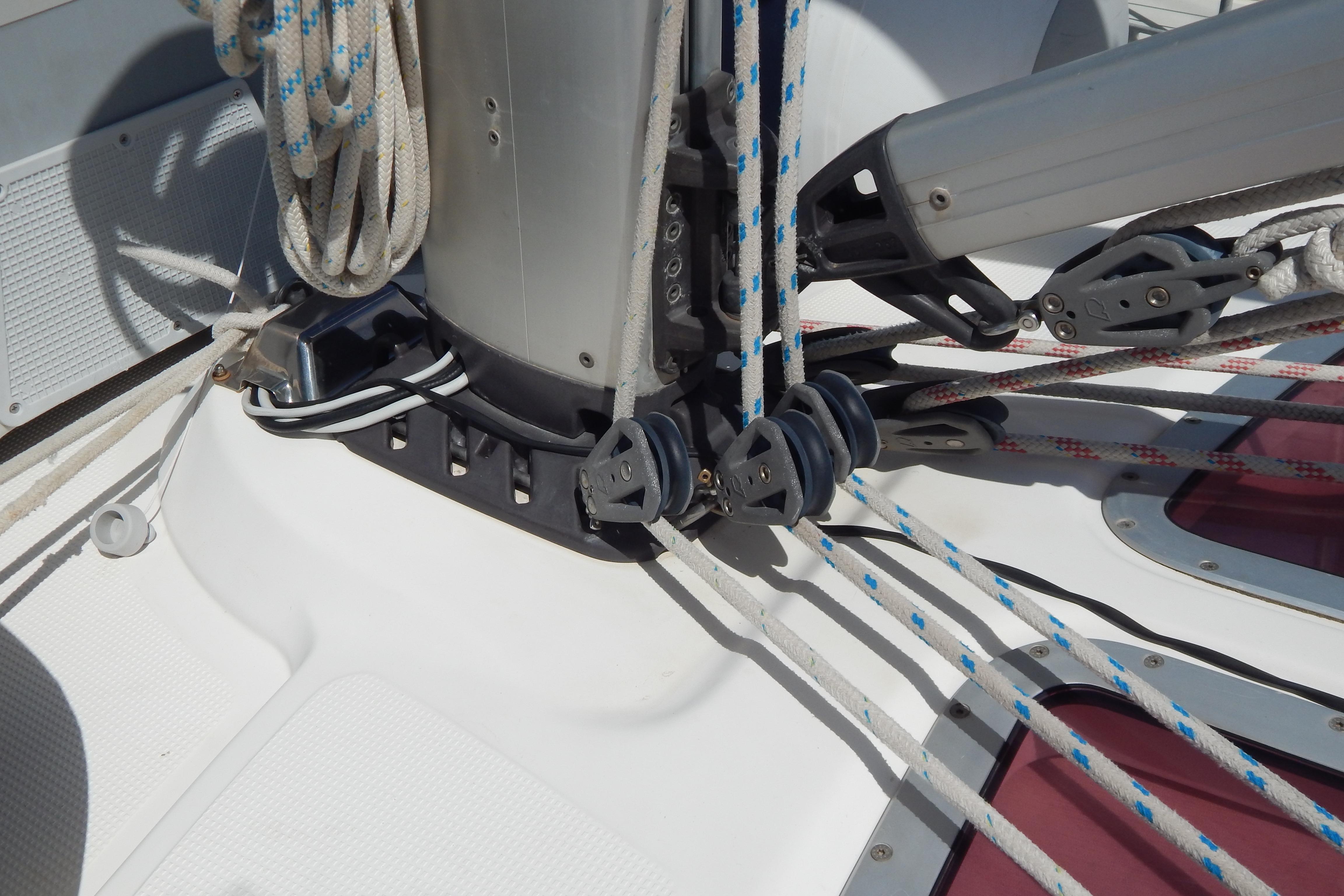 Sailing rigging on a 2005 Bavaria 37 Cruiser yacht, featuring ropes and pulleys.