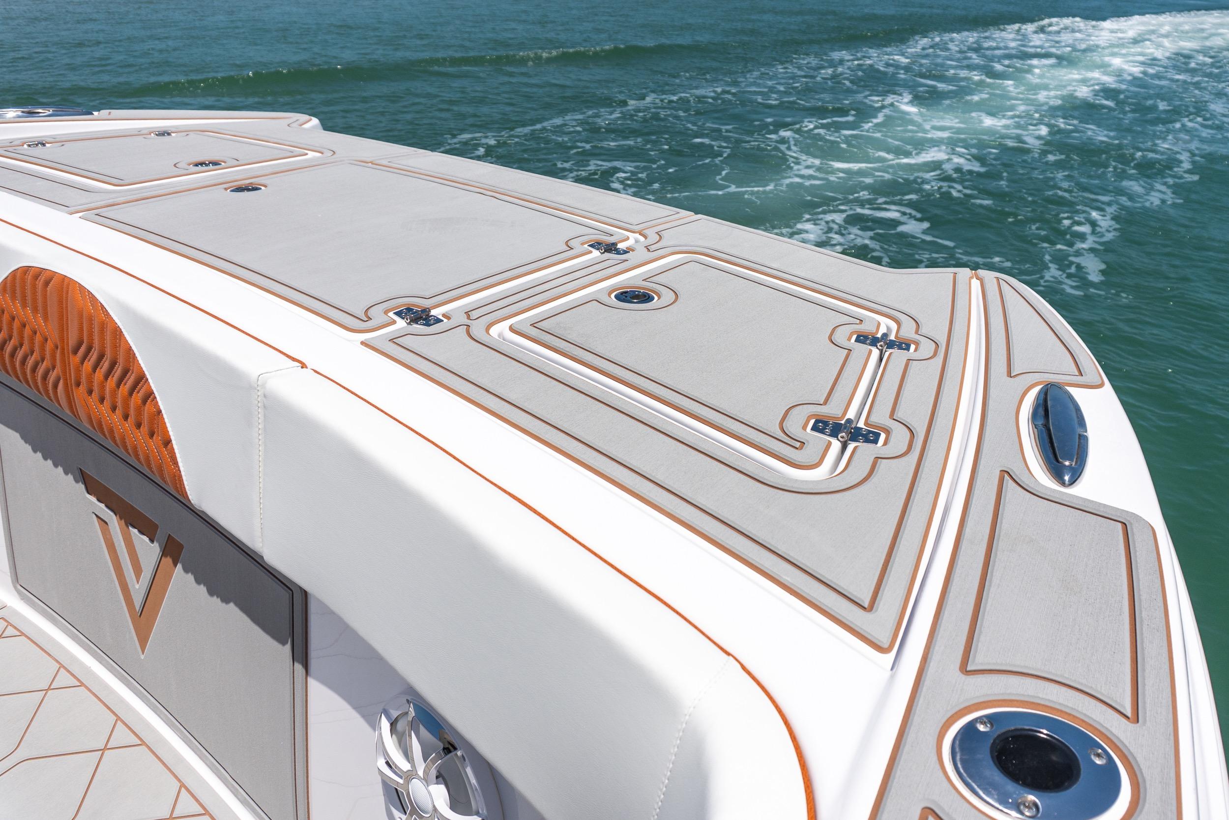 2026 Twin Vee 400 GFX2 CC boat deck with sleek design on open water.