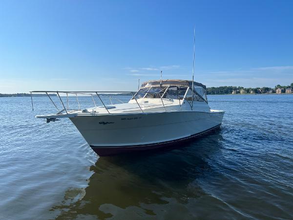 1985 Viking 35 Express on calm water.