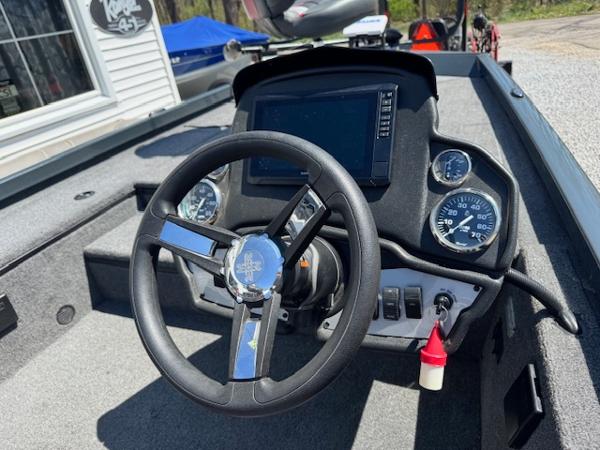 2023 Ranger RT178 boat dashboard with steering wheel and gauges.