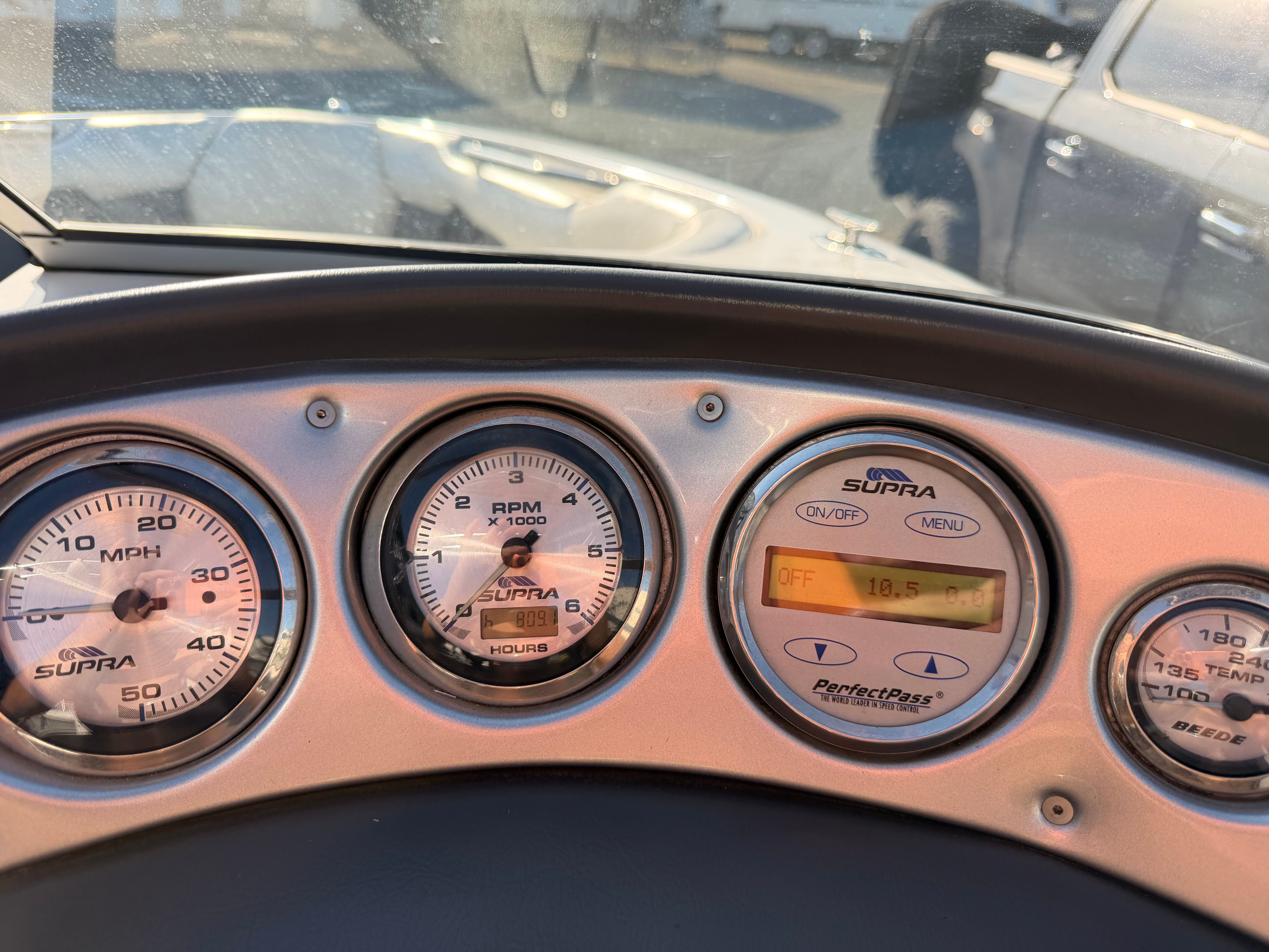 Dashboard of a 2004 Supra Launch SSV with gauges.