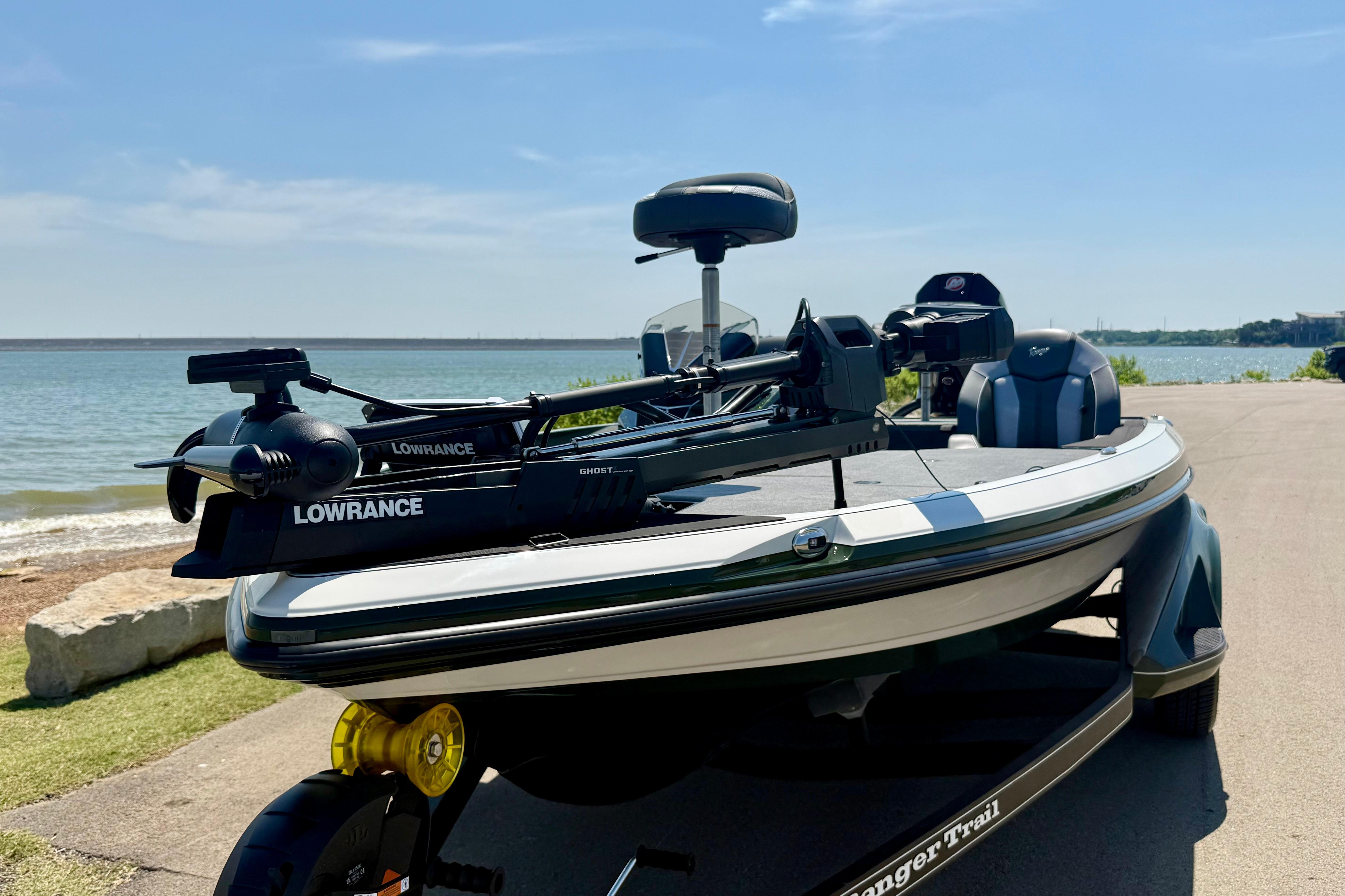 2026 Ranger Z519R boat with Lowrance equipment, parked by a scenic lakeside.
