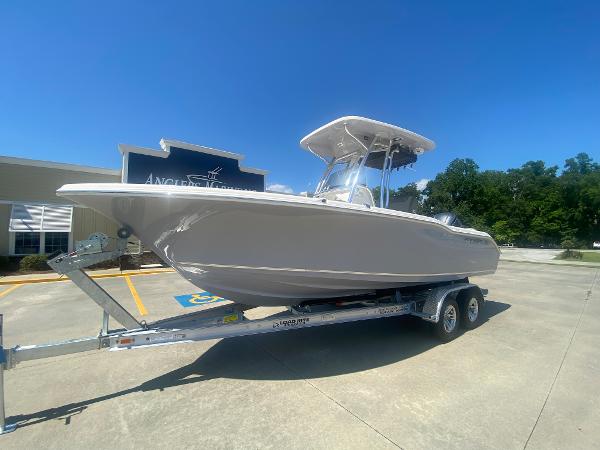 2024 Key West 239 FS boat on a trailer in a parking lot.