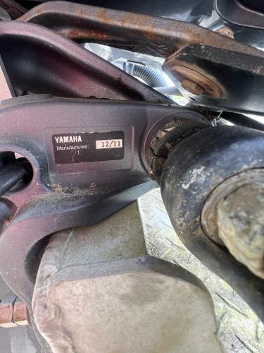 Close-up of Yamaha boat engine part, manufactured December 2011, on Custom Flat 28 Cabin Boat.