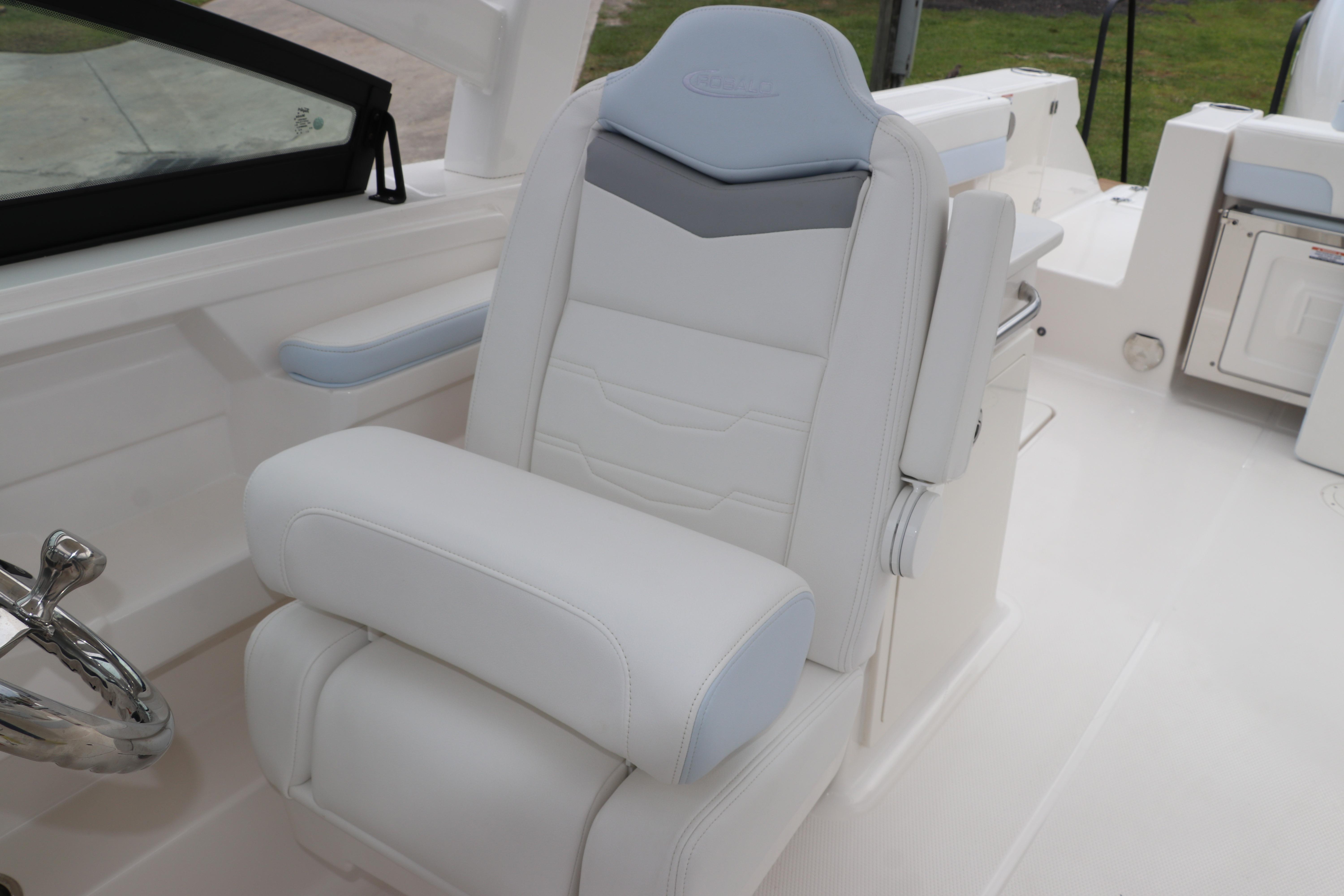 2026 Robalo R257 Dual Console boat seat, white and gray upholstery, sleek design.
